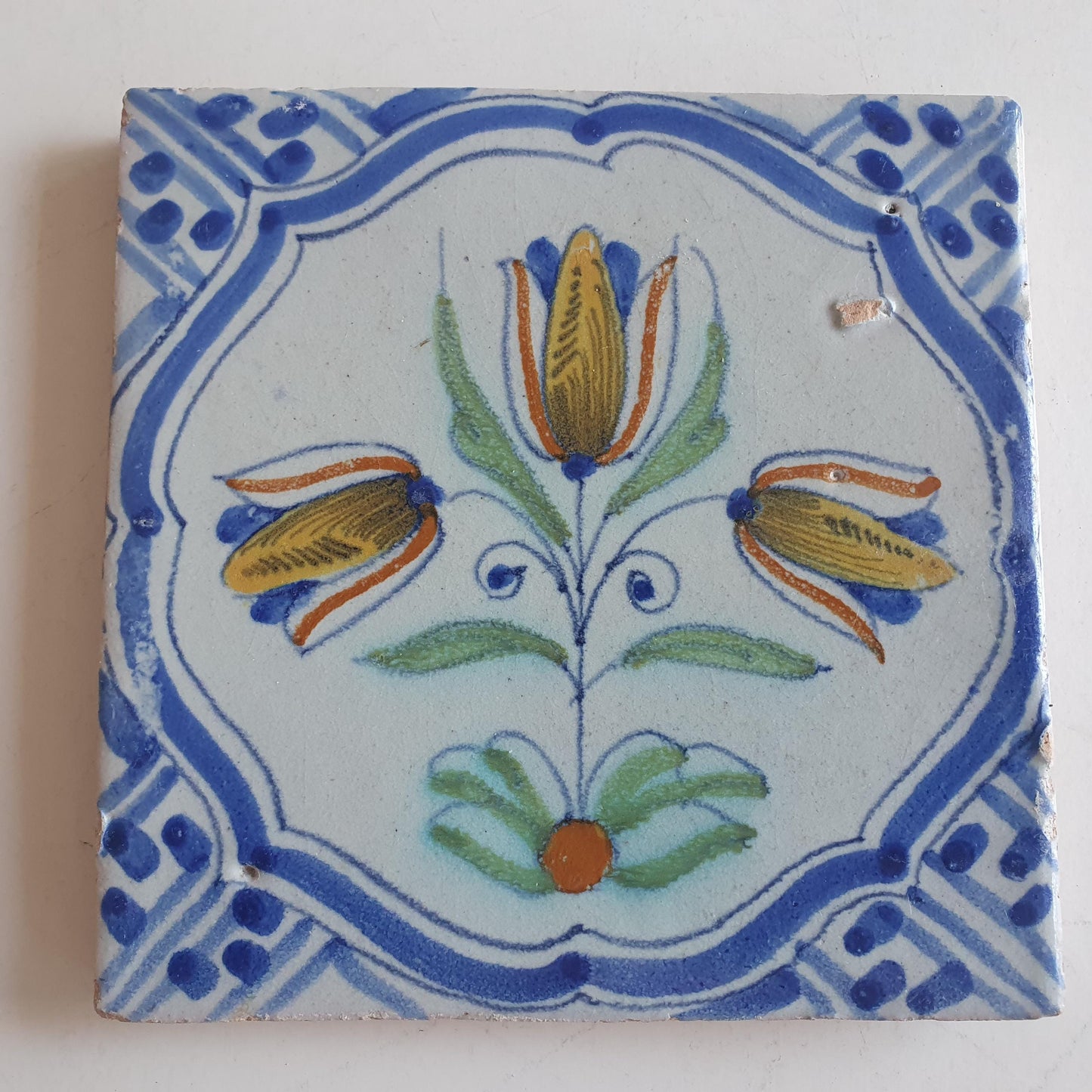 Antique Delft Tile – 17th Century Dutch Polychrome Flower