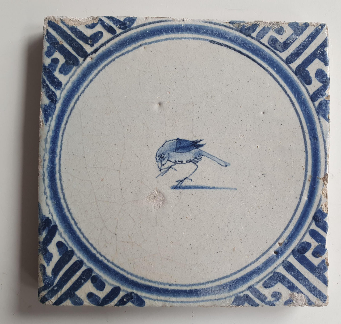 Antique Dutch circle Tile - wan-li cirkel - Dated around 1660, wan-li corner with bird