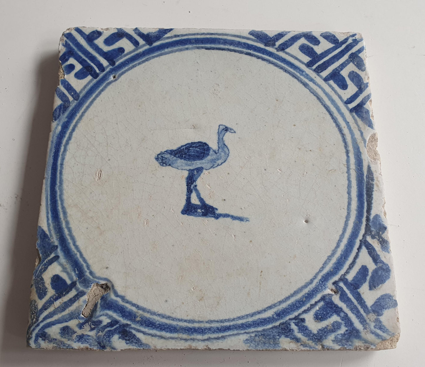 Antique Dutch circle Tile - wan-li cirkel - Dated around 1660, wan-li corner with ostrich