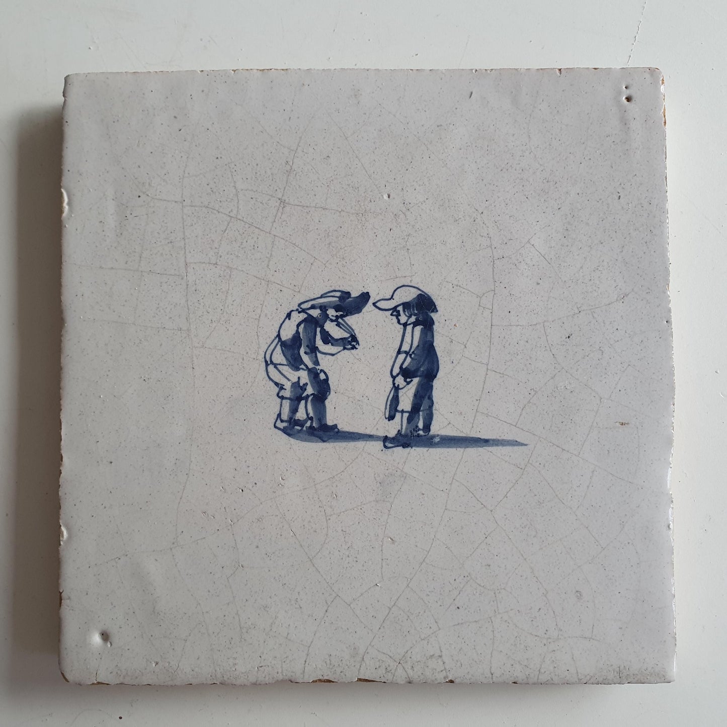 Antique Dutch Tile with child,s play  - Dated 1700, no corner motif