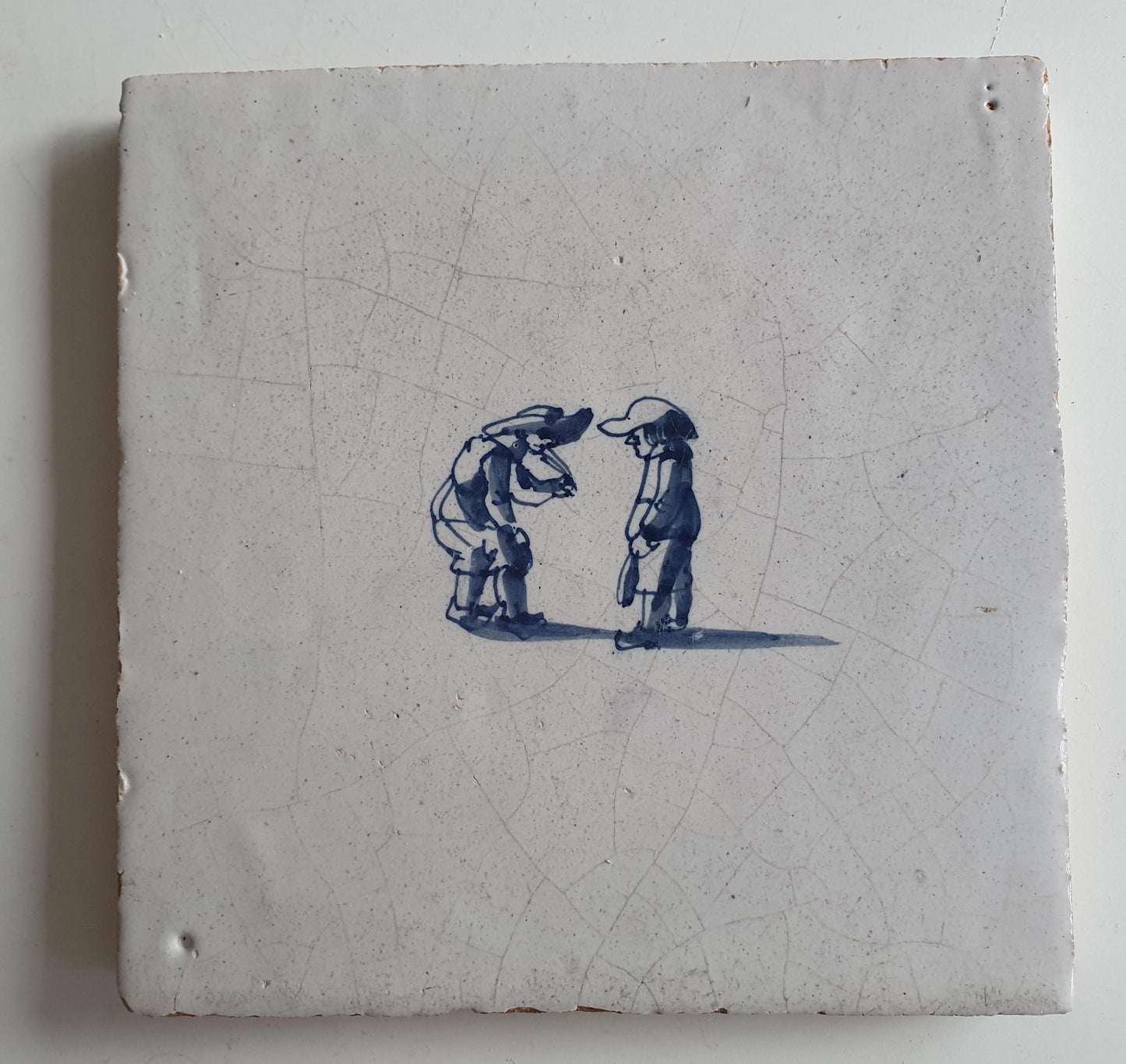 Antique Dutch Tile with child,s play  - Dated 1700, no corner motif