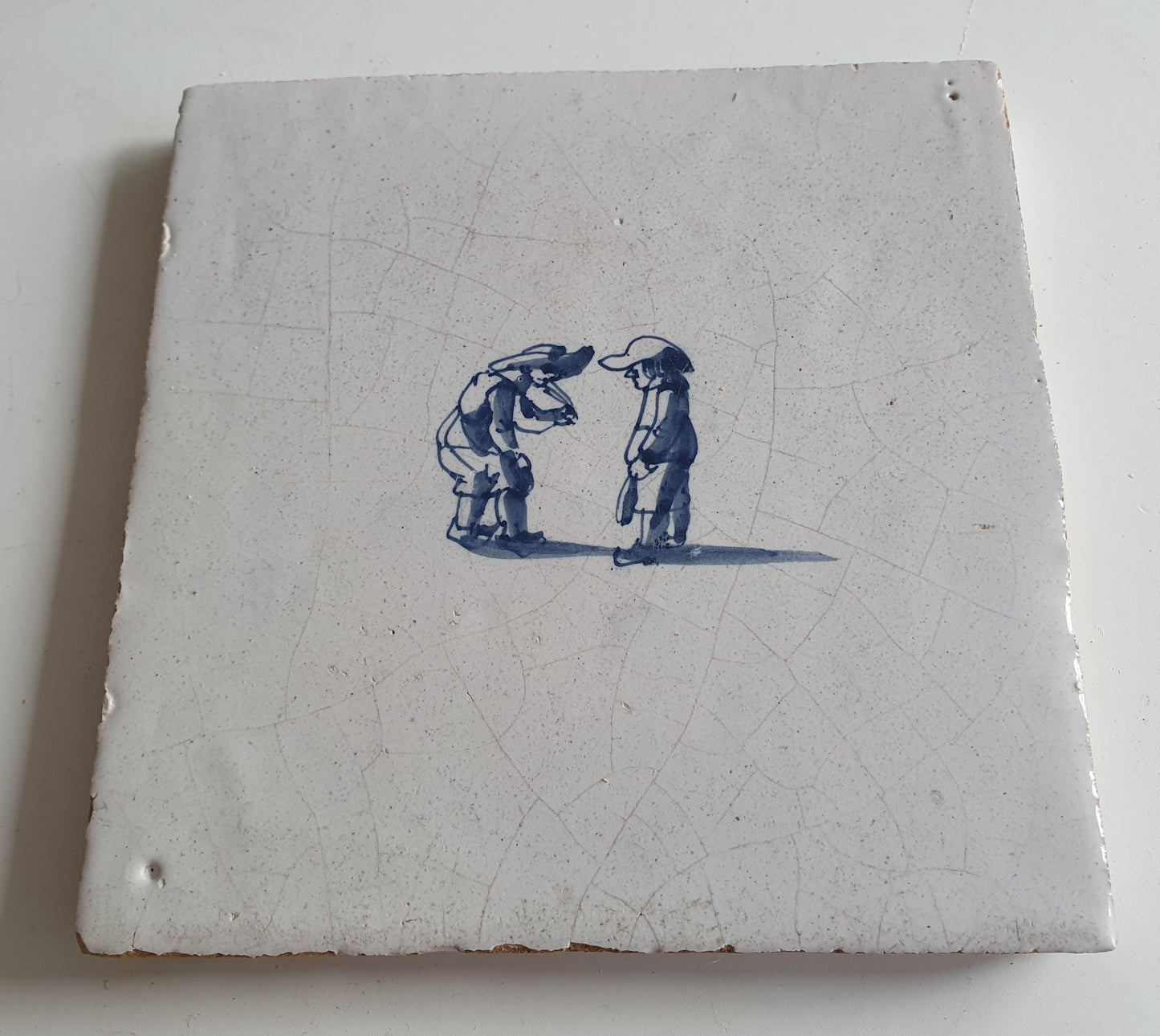 Antique Dutch Tile with child,s play  - Dated 1700, no corner motif