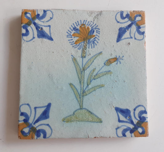 dutch flower  Gouda rare delft polychrome tile, 1620