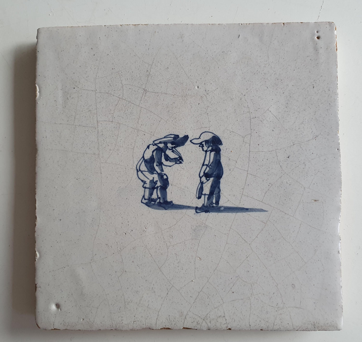 Antique Dutch Tile with child,s play  - Dated 1700, no corner motif