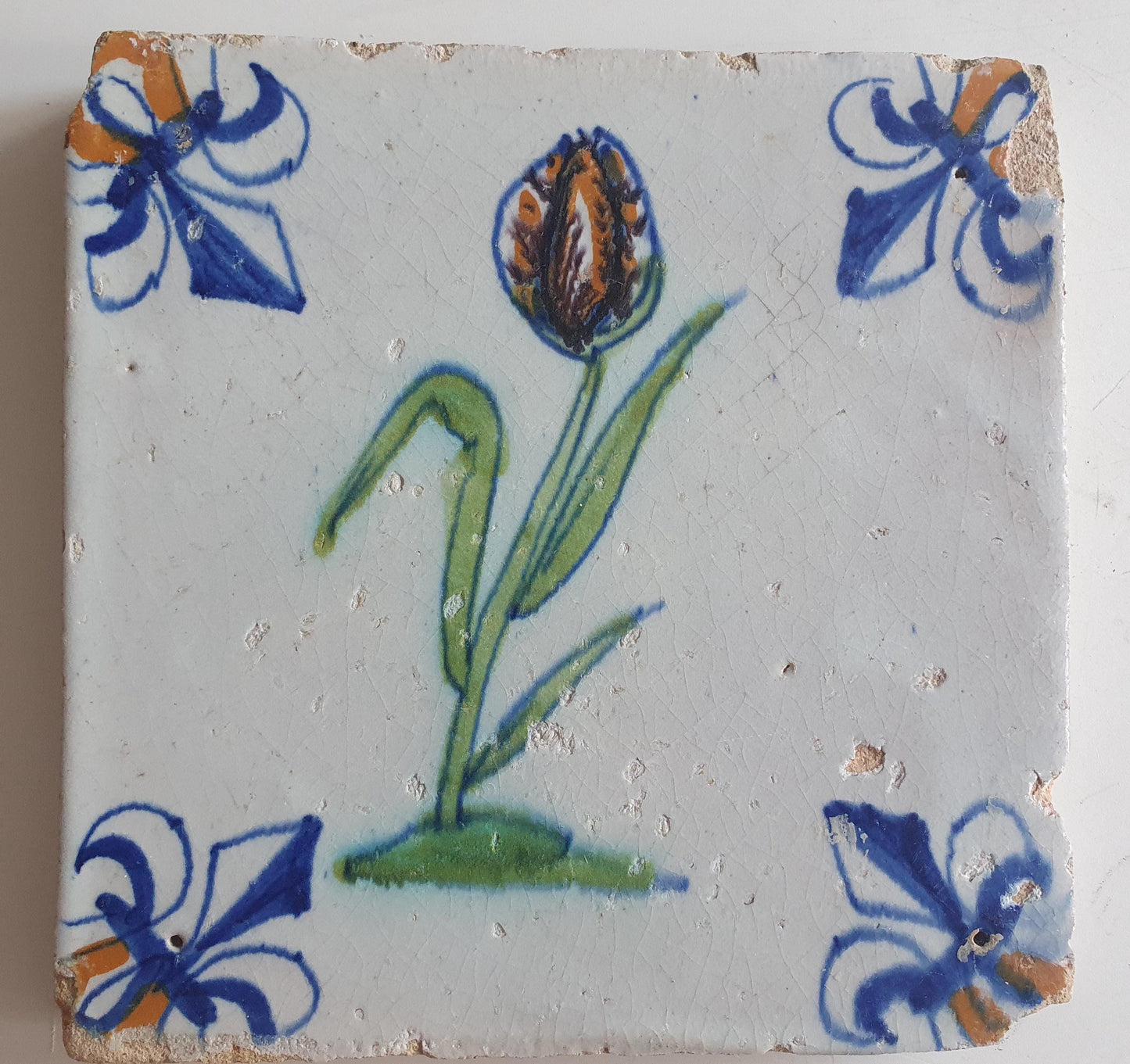 dutch flower  Gouda rare delft polychrome tile, 1620