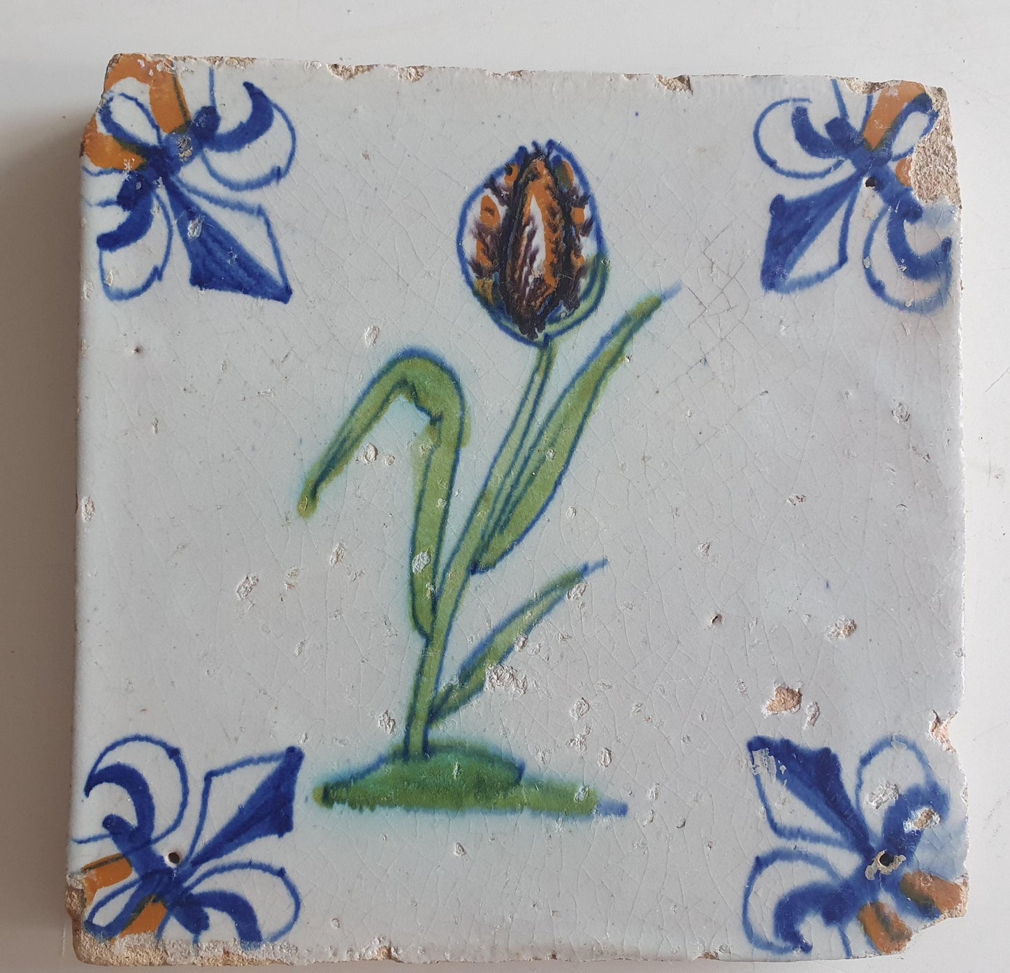 dutch flower  Gouda rare delft polychrome tile, 1620