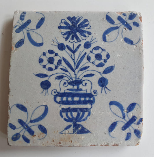17th century Antique Dutch Tile flower with lilyhead corner motive delft blue holland tile