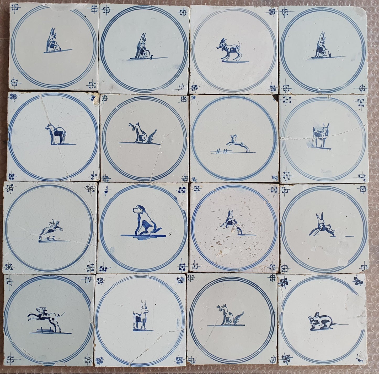 Antique Delft Tiles, 18th Century Dutch Animal Motifs, Set of 16 circle springer