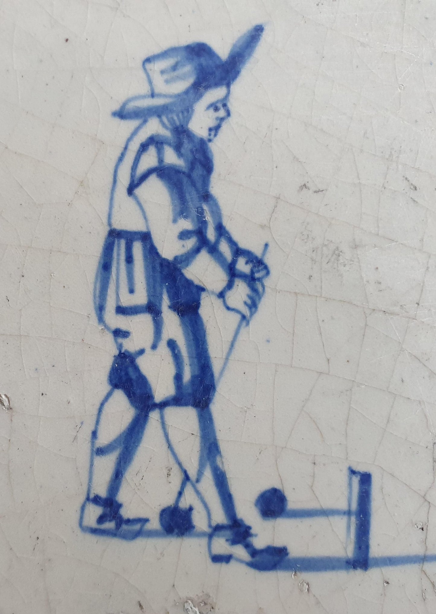 17th Delft tile was  made around 1650, with a golf player