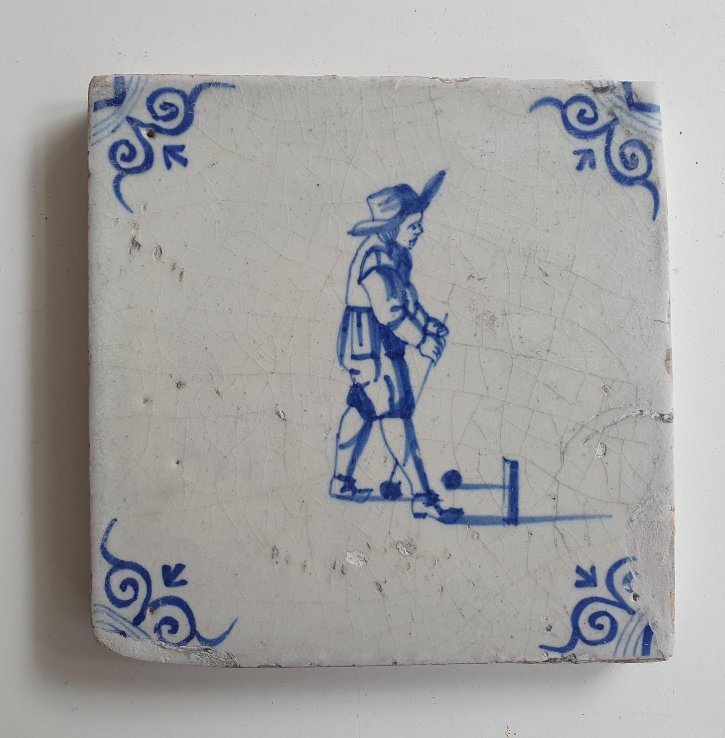 17th Delft tile was  made around 1650, with a golf player