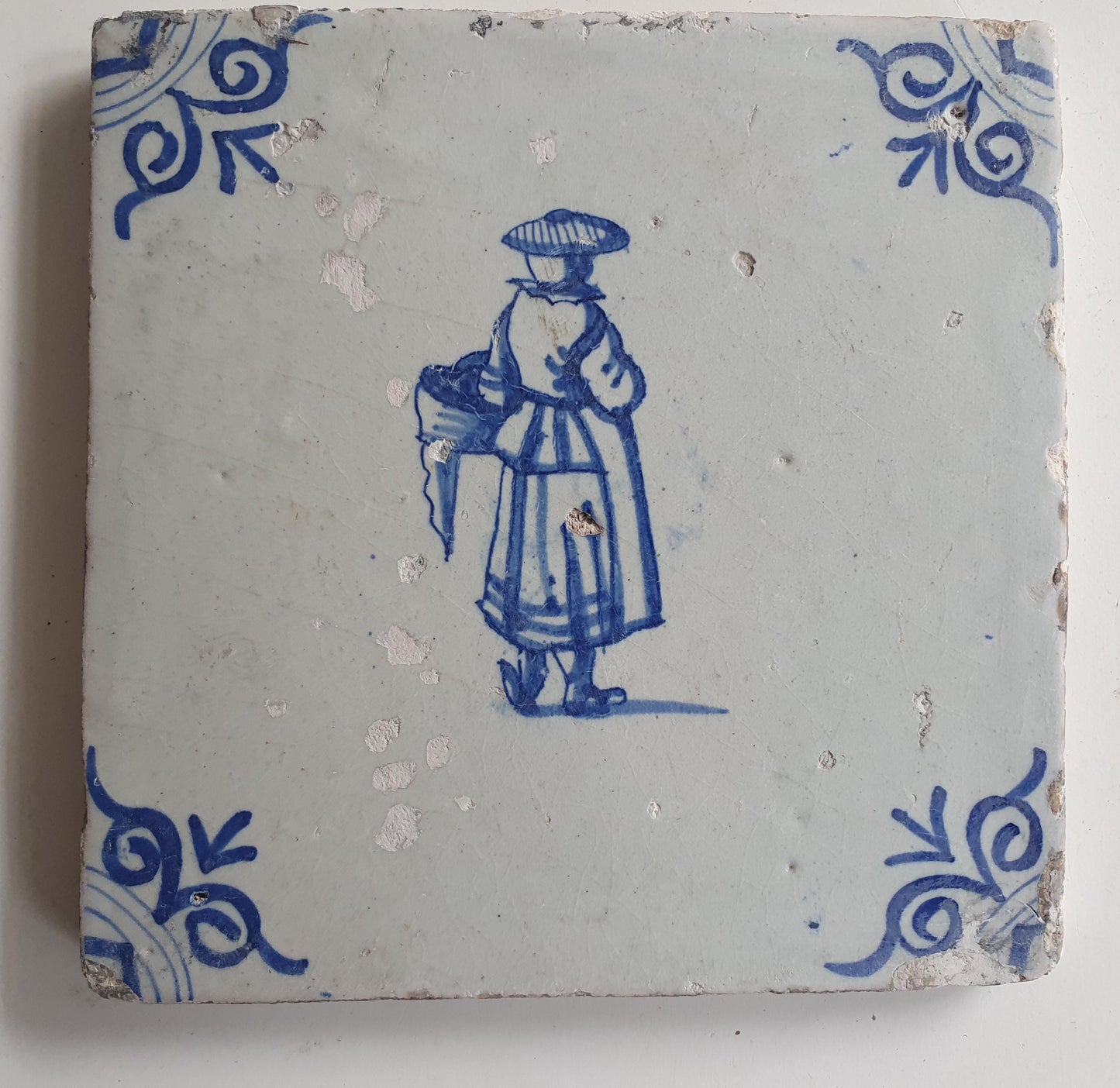 17th Delft tile was  made around 1650 with a lady