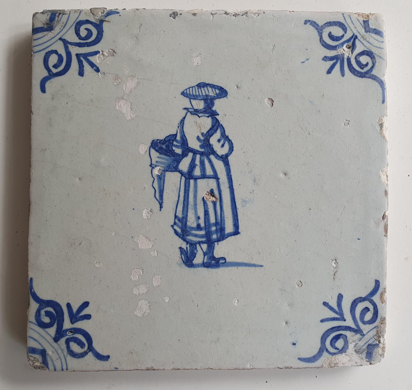 17th Delft tile was  made around 1650 with a lady