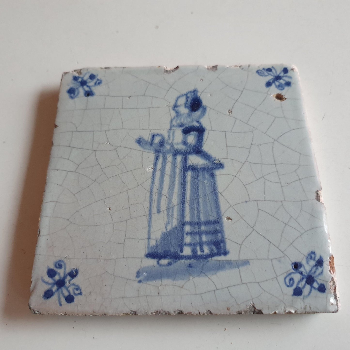 17th Delft tile was  made around 1650 with a lady