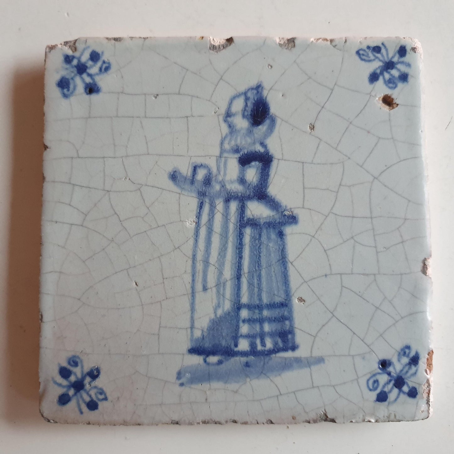 17th Delft tile was  made around 1650 with a lady