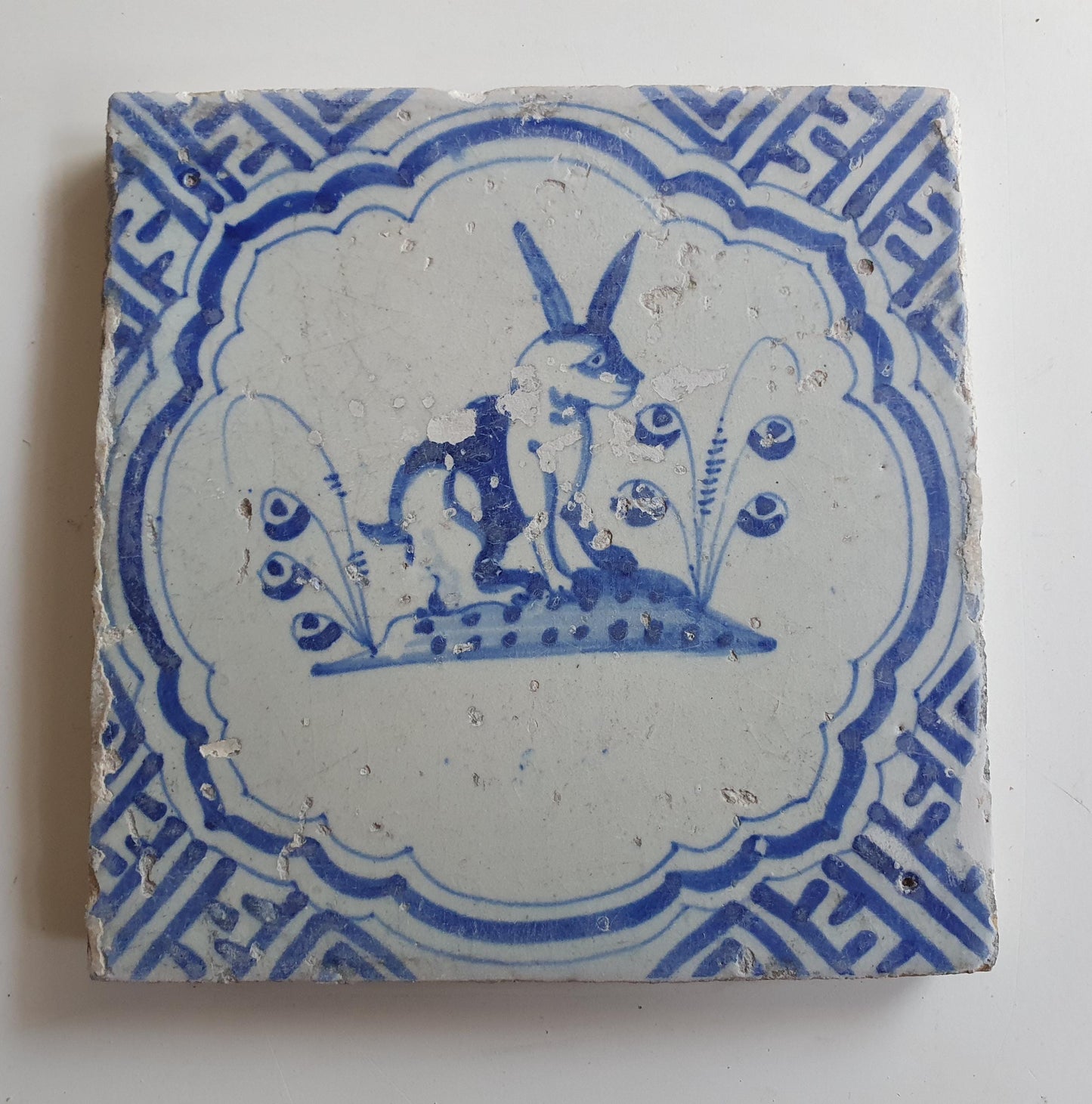 17th Antique Dutch Delft Blue Tile - rabbit with a meander shape - Dated around 1640