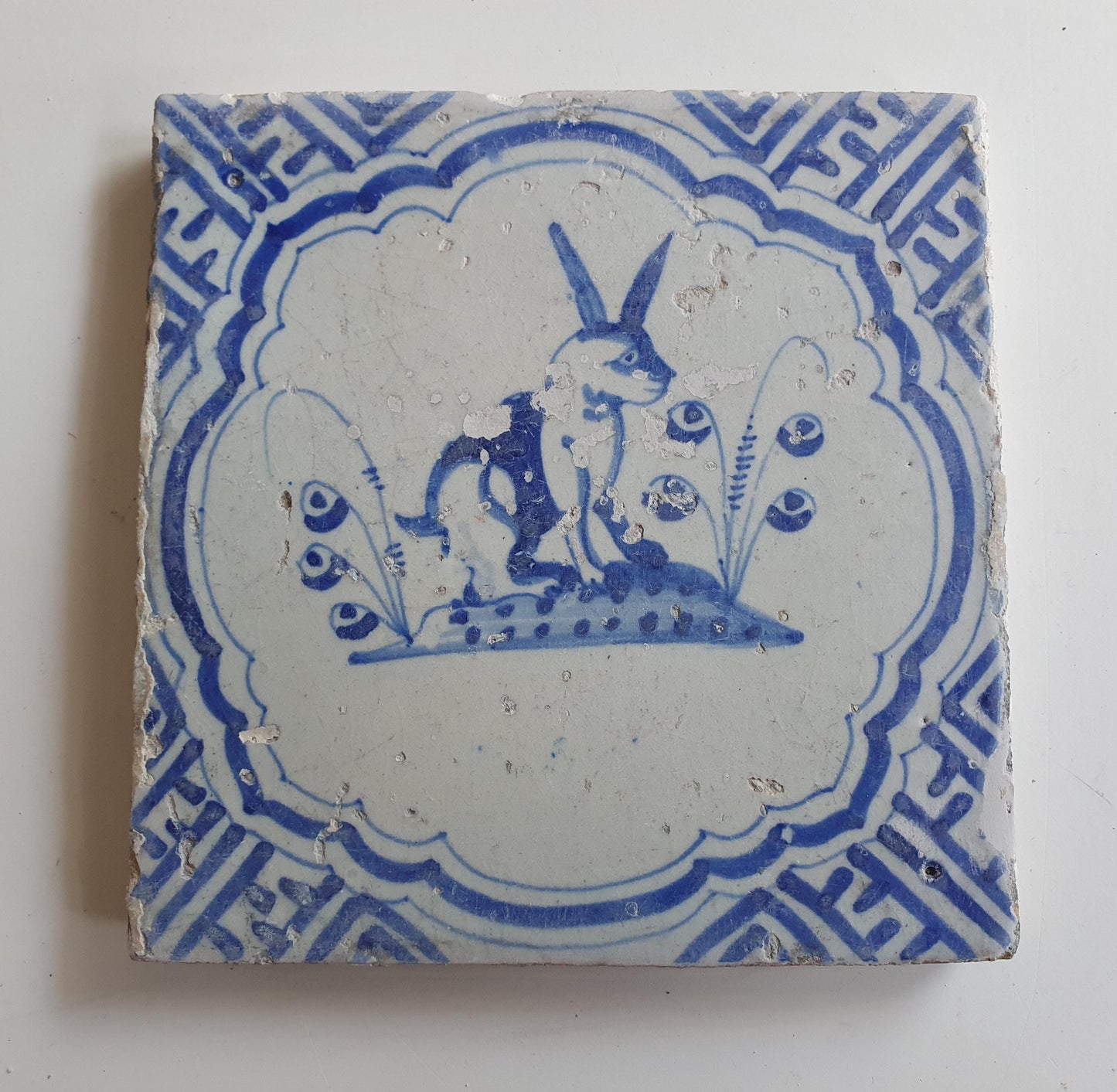 17th Antique Dutch Delft Blue Tile - rabbit with a meander shape - Dated around 1640