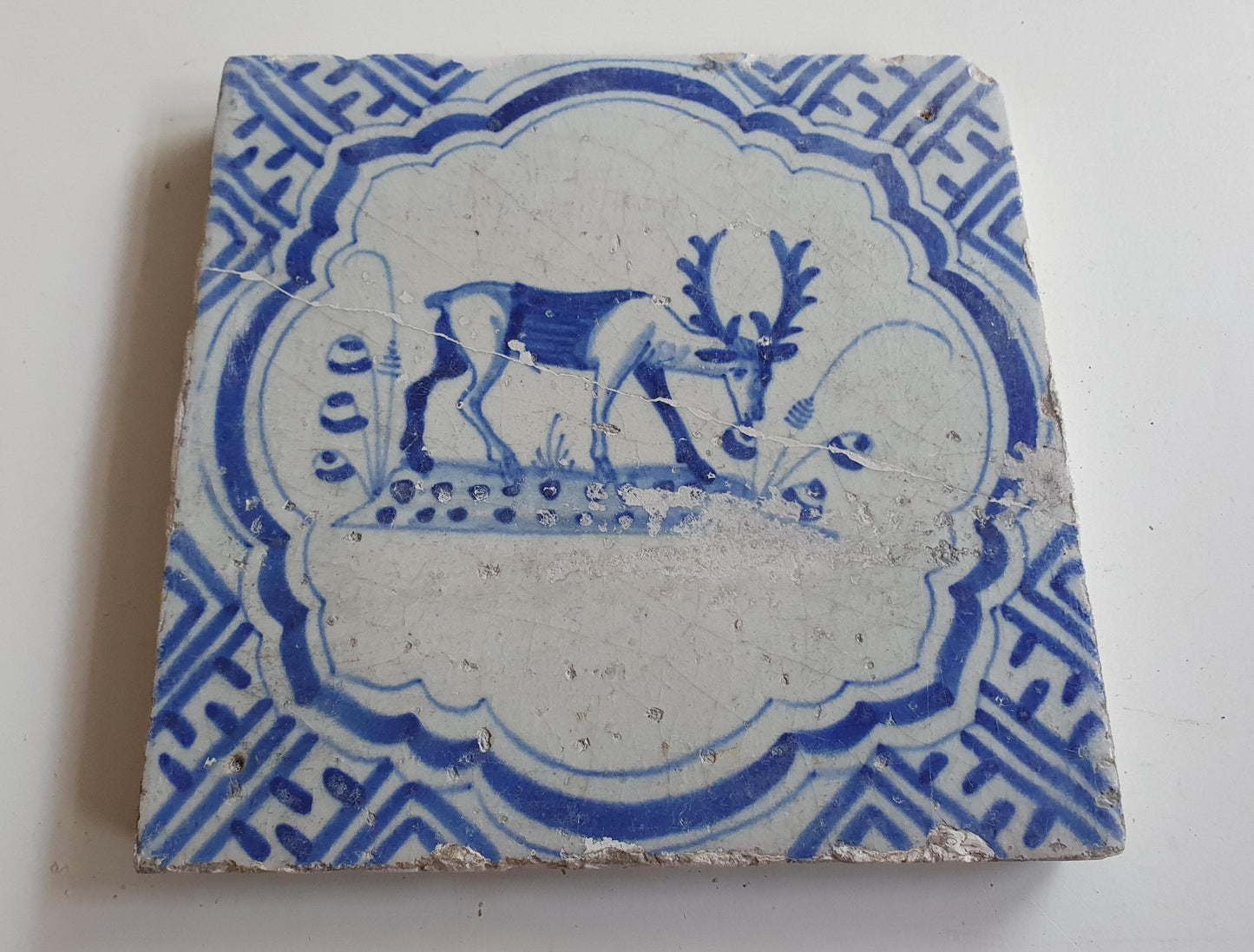 17th Antique Dutch Delft Blue Tile - rabbit with a meander shape - Dated around 1640