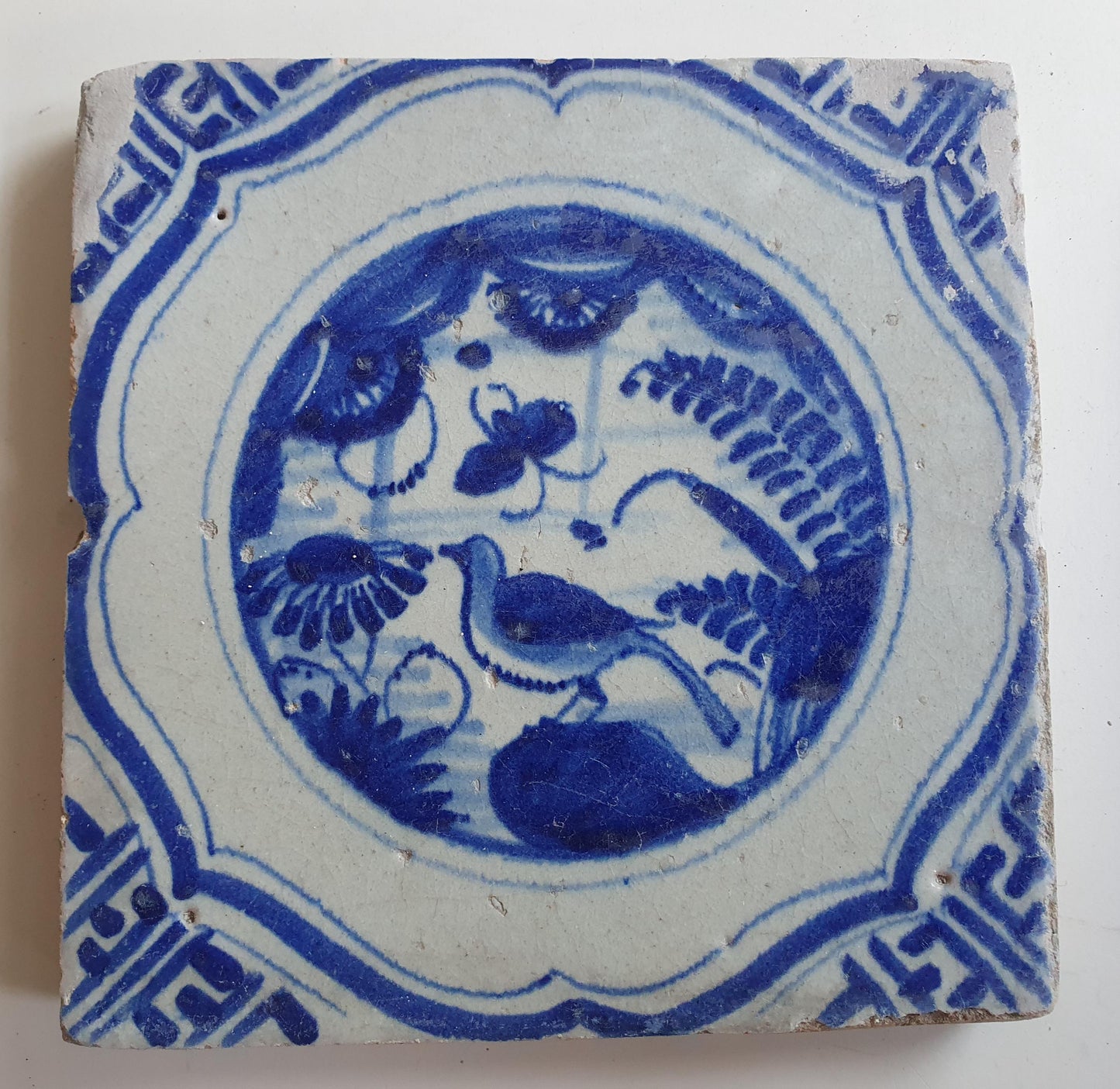 17th Antique Dutch Delft Blue Tile - Chinese garden with a meander shape - Dated around 1640