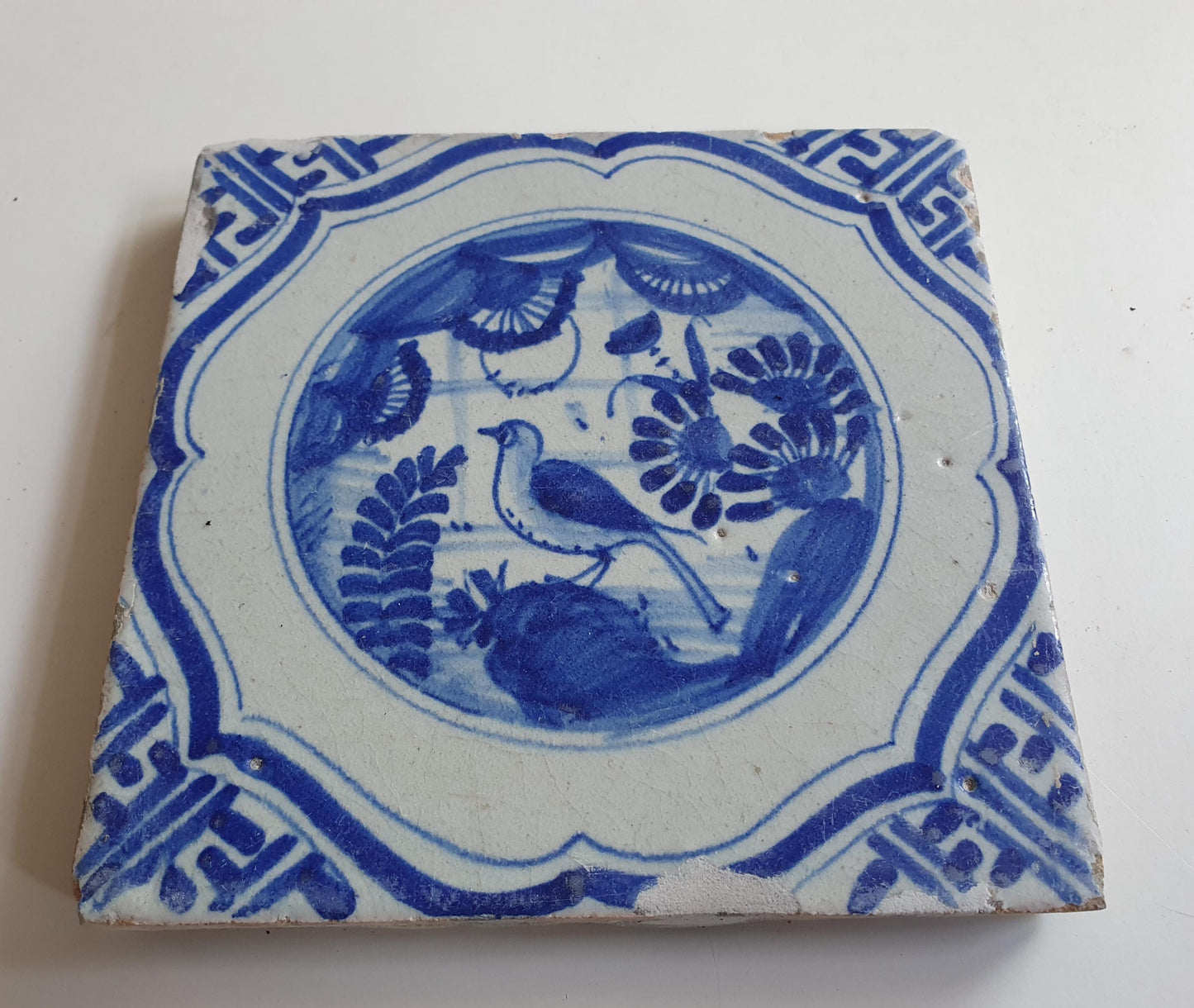 17th Antique Dutch Delft Blue Tile - Chinese garden with a meander shape - Dated around 1640