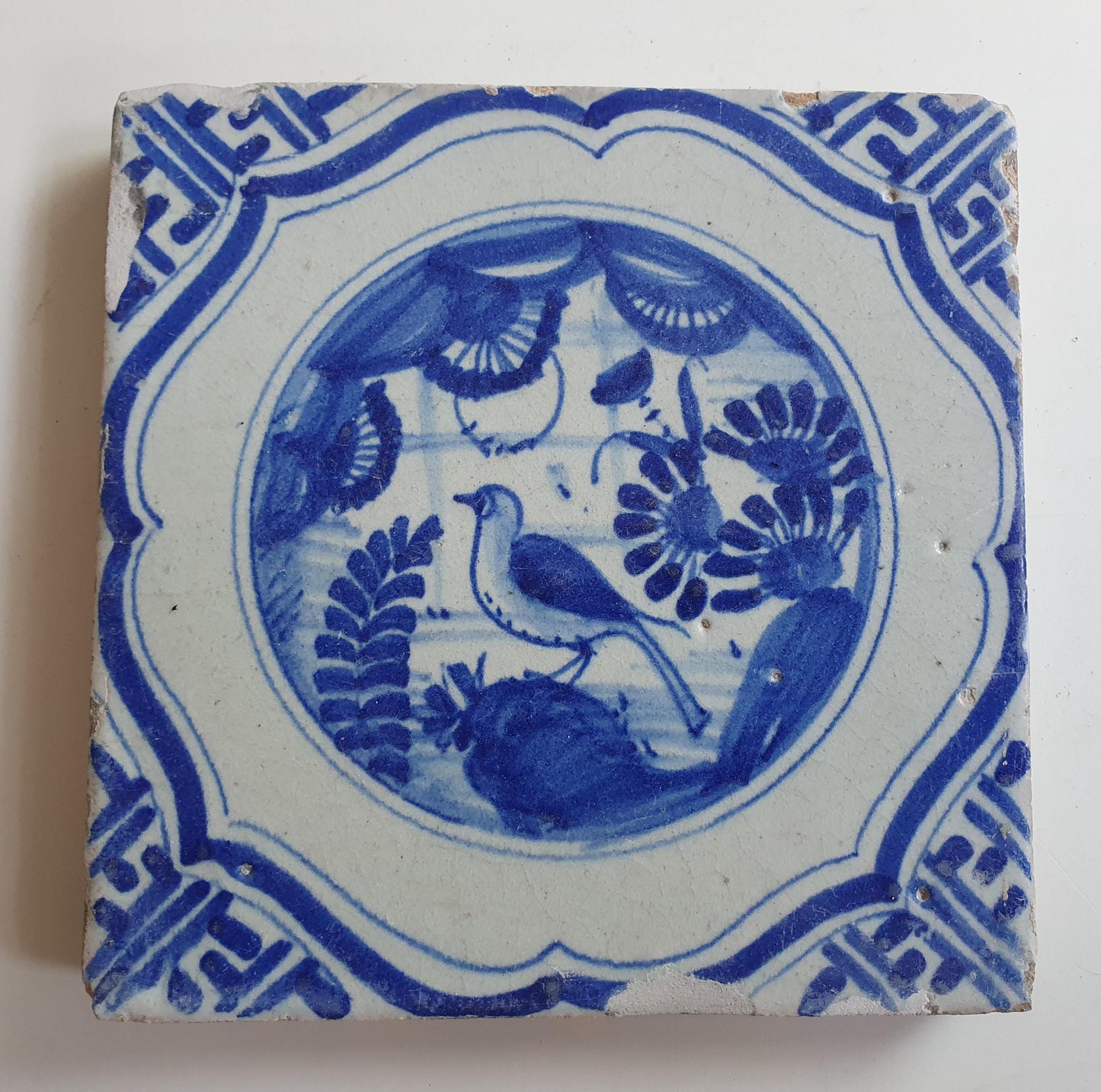 17th Antique Dutch Delft Blue Tile - Chinese garden with a meander shape - Dated around 1640