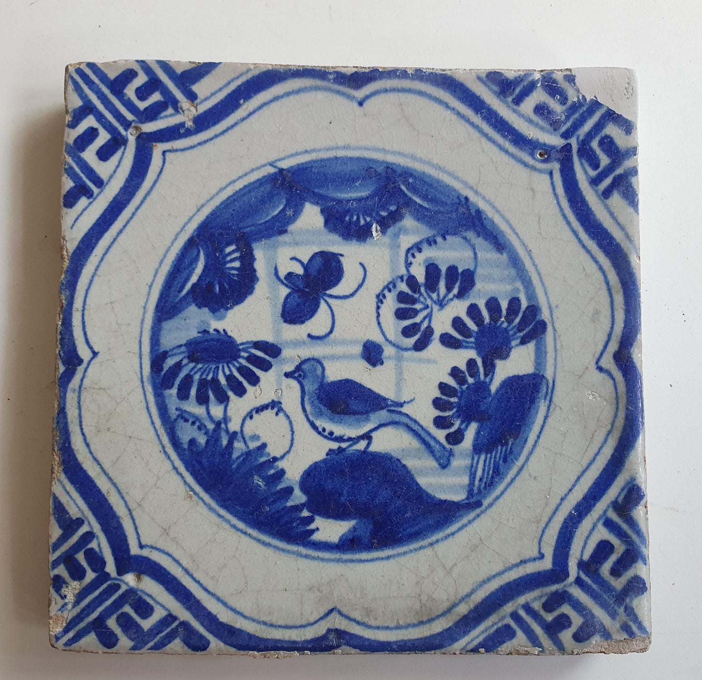 Antique Delft Tile – 17th Century Dutch walltile, Chinese Garden Scene, Meander Shape