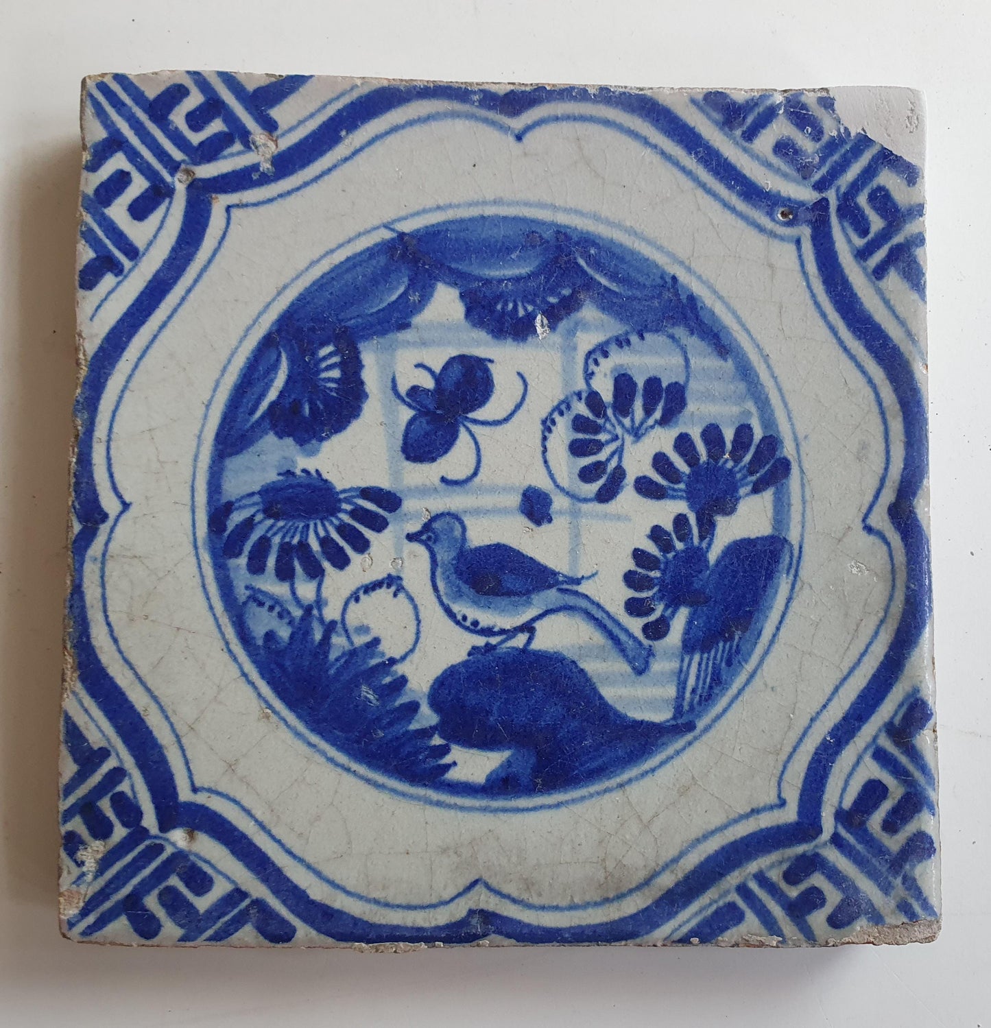 Antique Delft Tile – 17th Century Dutch walltile, Chinese Garden Scene, Meander Shape