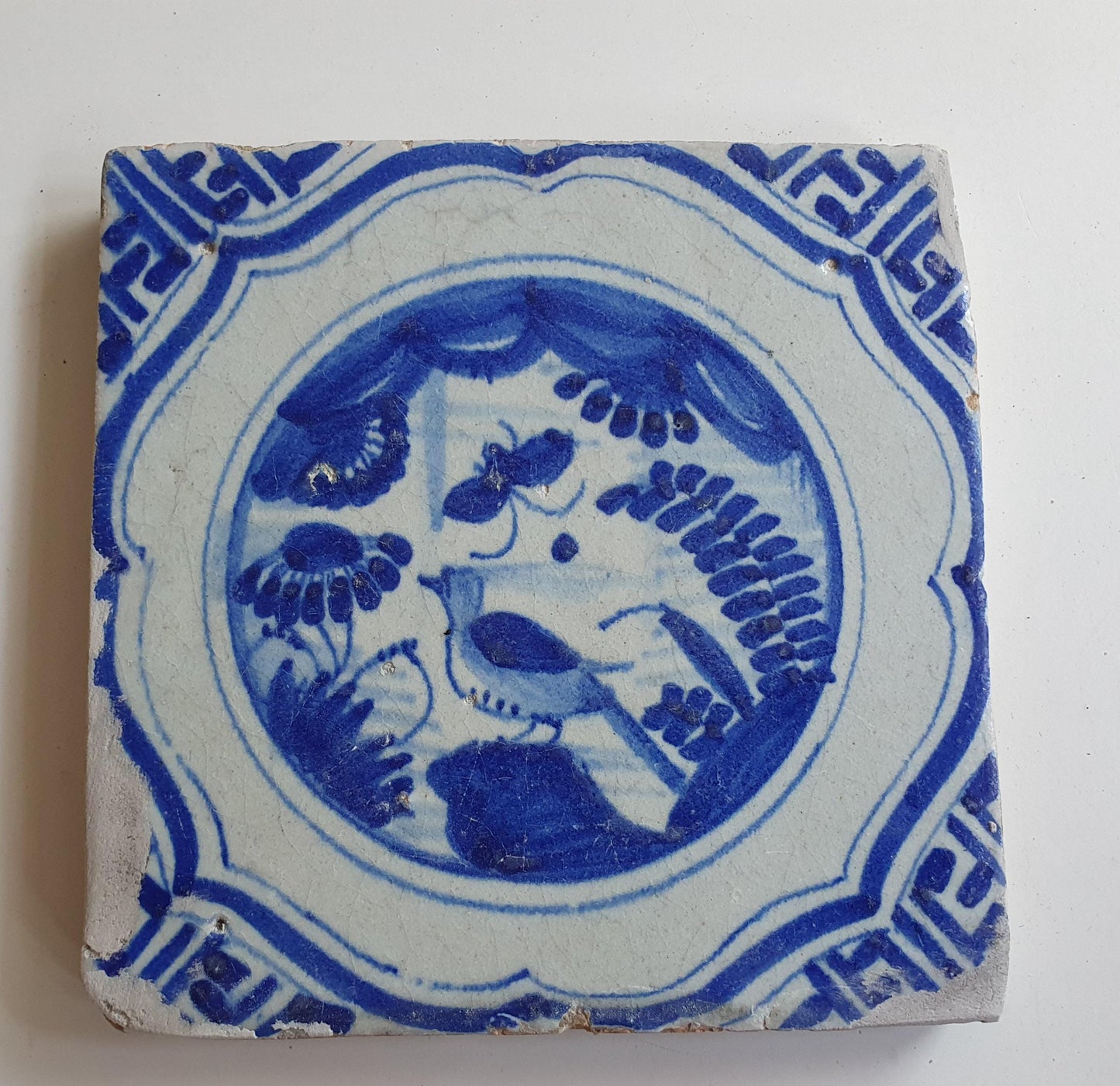 17th Antique Dutch Delft Blue Tile - Chinese garden with a meander shape - Dated around 1640