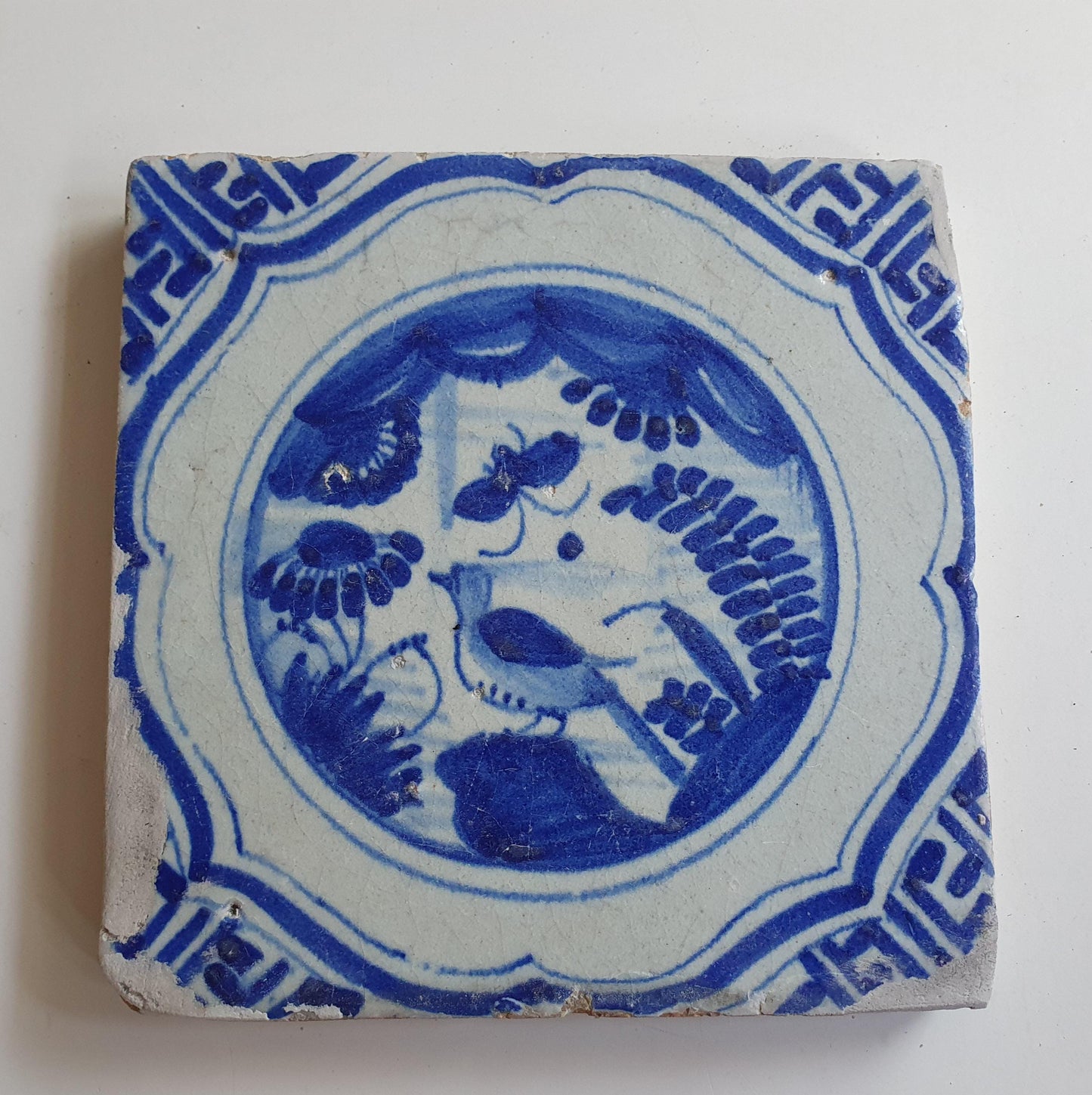 17th Antique Dutch Delft Blue Tile - Chinese garden with a meander shape - Dated around 1640