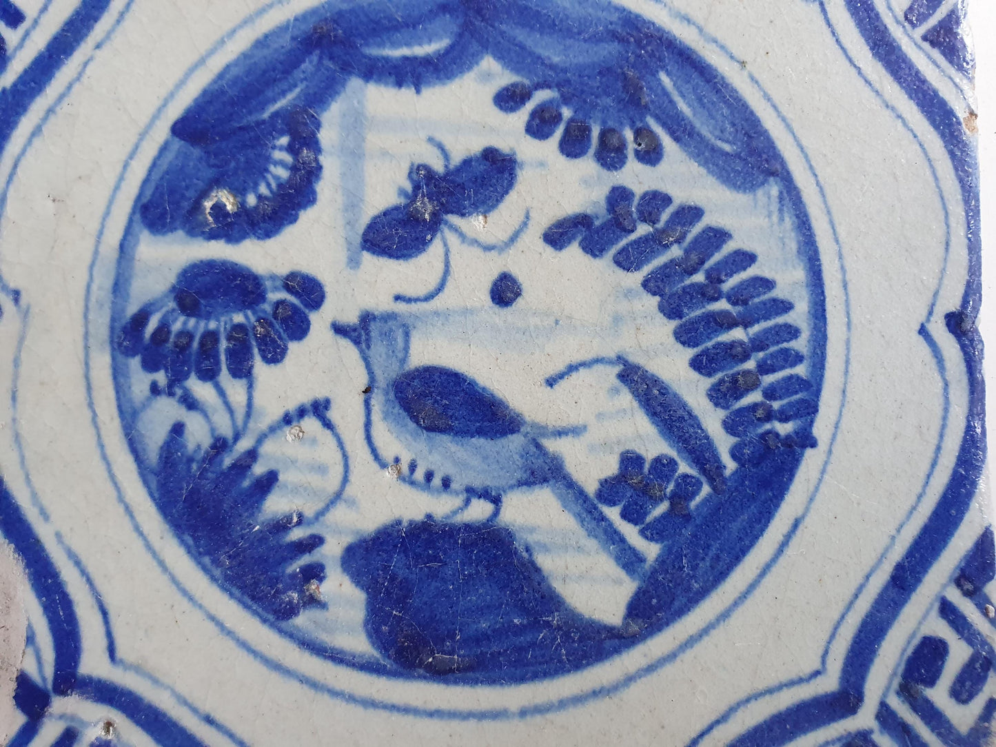 17th Antique Dutch Delft Blue Tile - Chinese garden with a meander shape - Dated around 1640