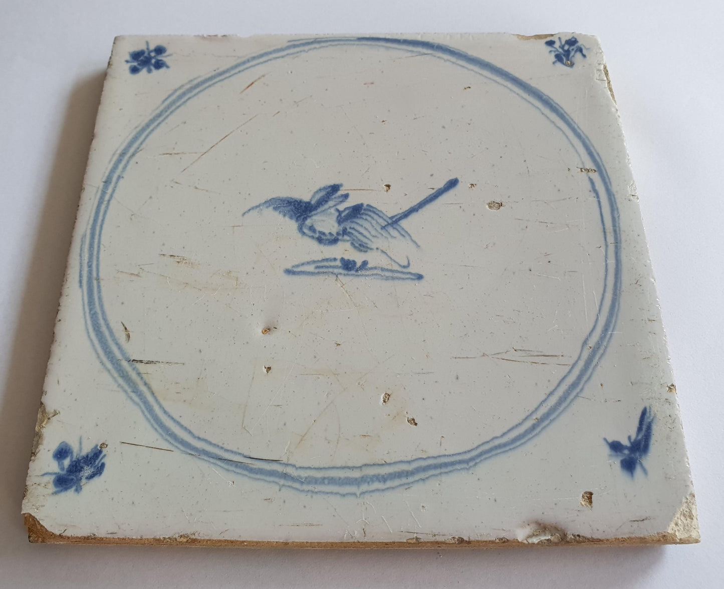 Antique Delft Tile: 18th Century Dutch Circle Tile with Bird