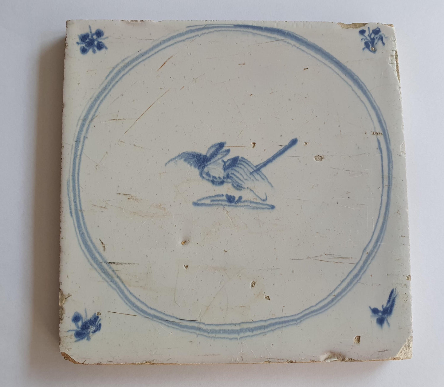 Antique Delft Tile: 18th Century Dutch Circle Tile with Bird
