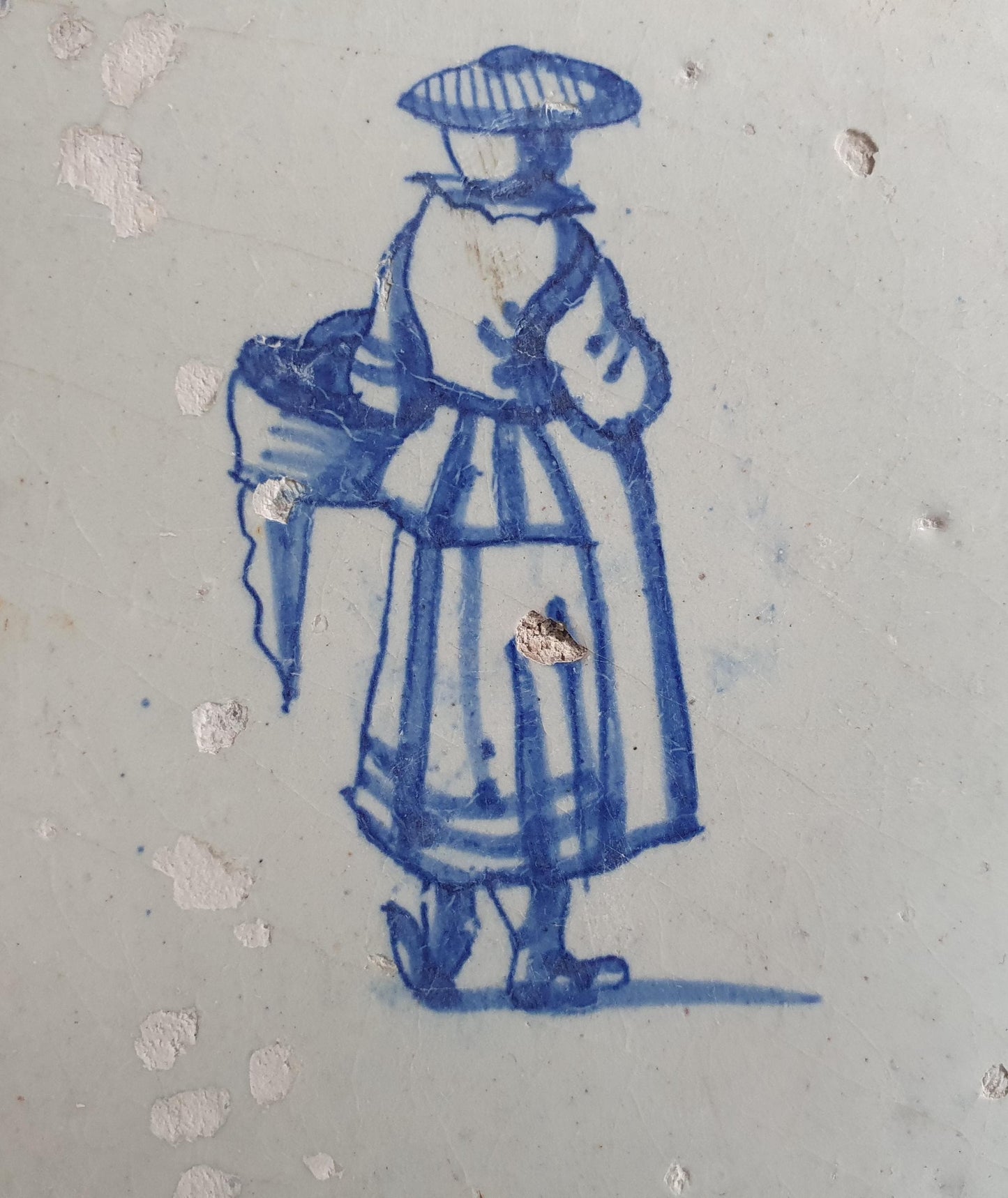 17th Delft tile was  made around 1650 with a lady