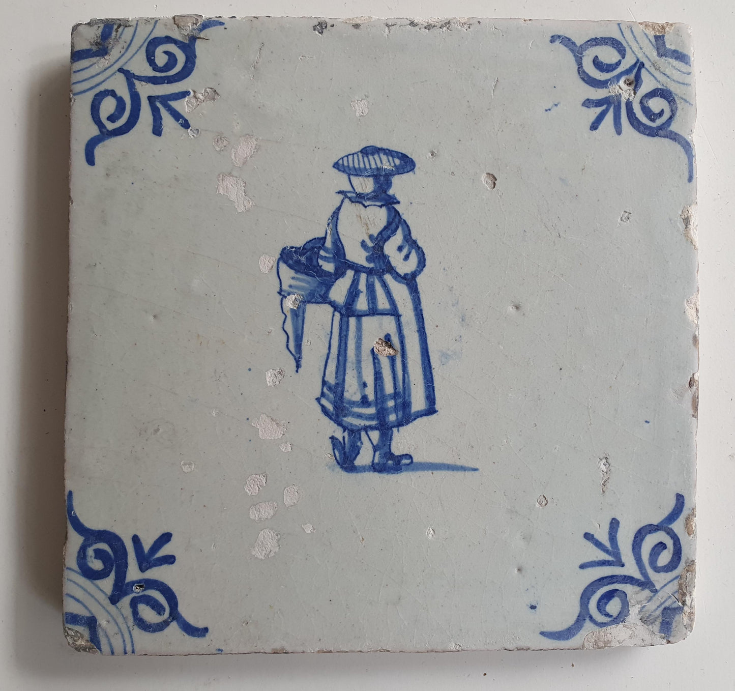 17th Delft tile was  made around 1650 with a lady