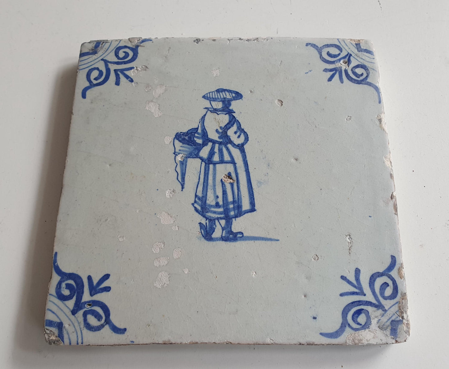 17th Delft tile was  made around 1650 with a lady