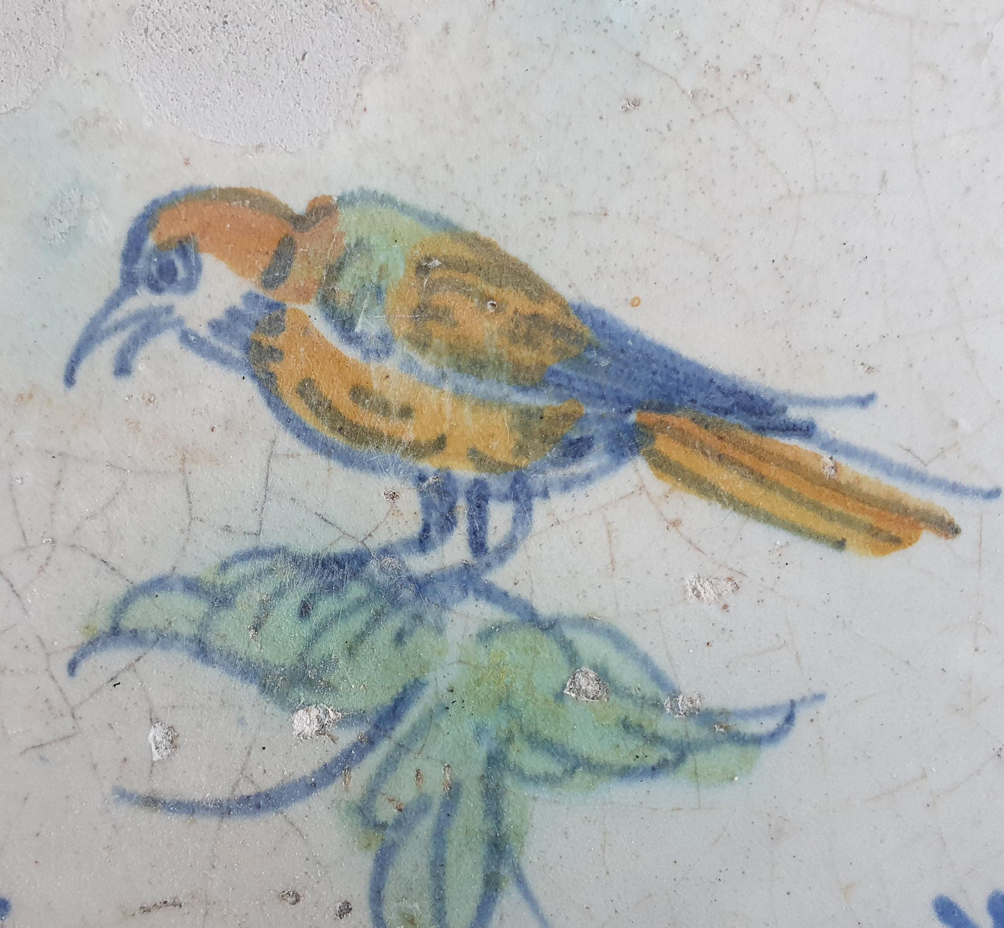 Antique Dutch Delft Tile – Polychrome Bird, Oxhead Motif (c. 1640)