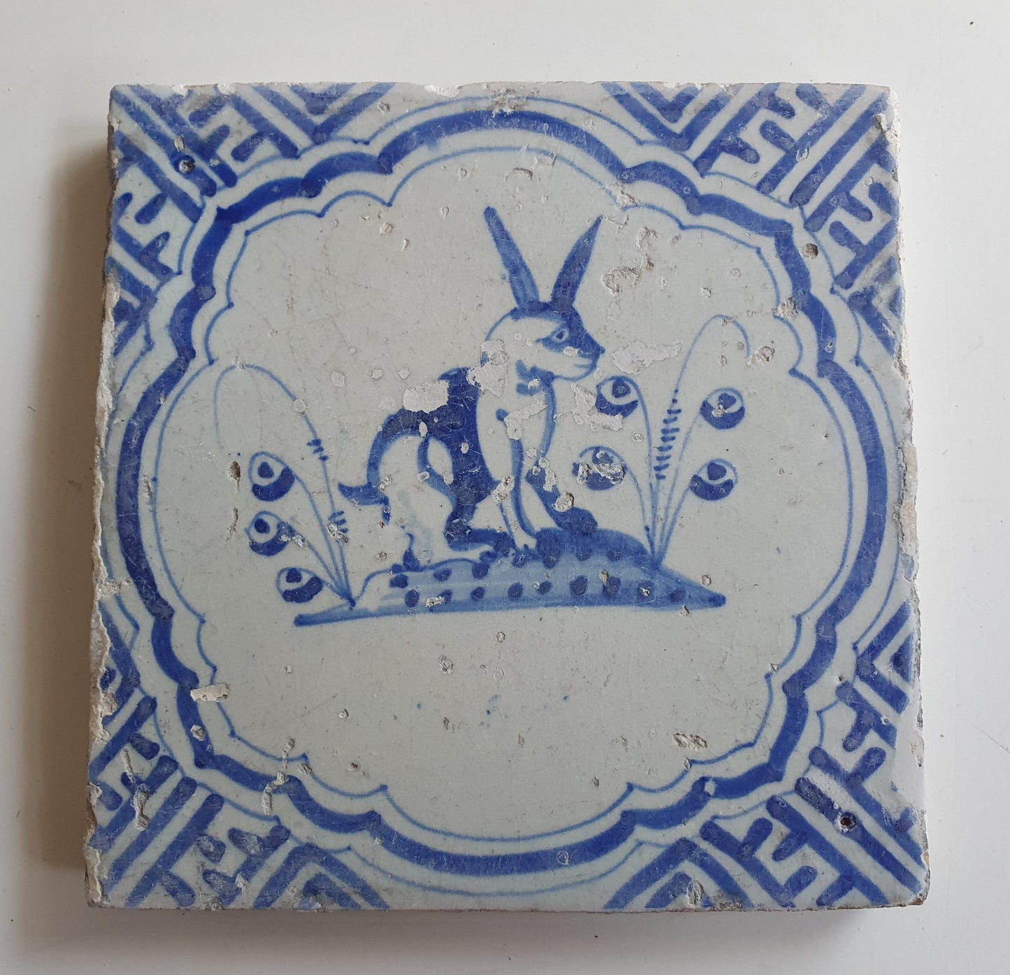 17th Antique Dutch Delft Blue Tile - rabbit with a meander shape - Dated around 1640