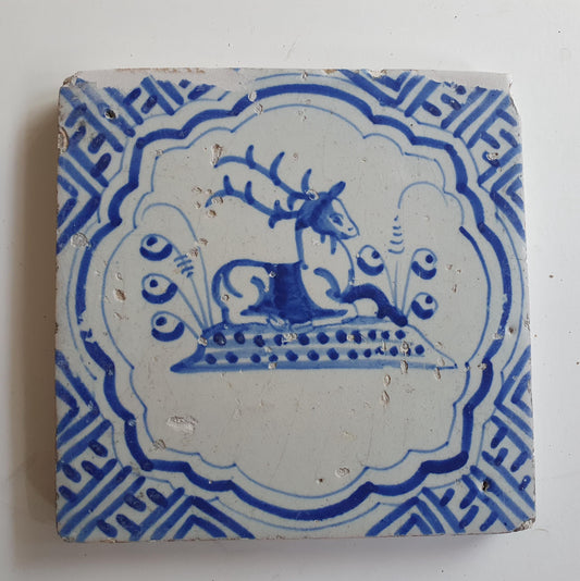 17th Antique Dutch Delft Blue Tile - deer with a meander shape - Dated around 1640