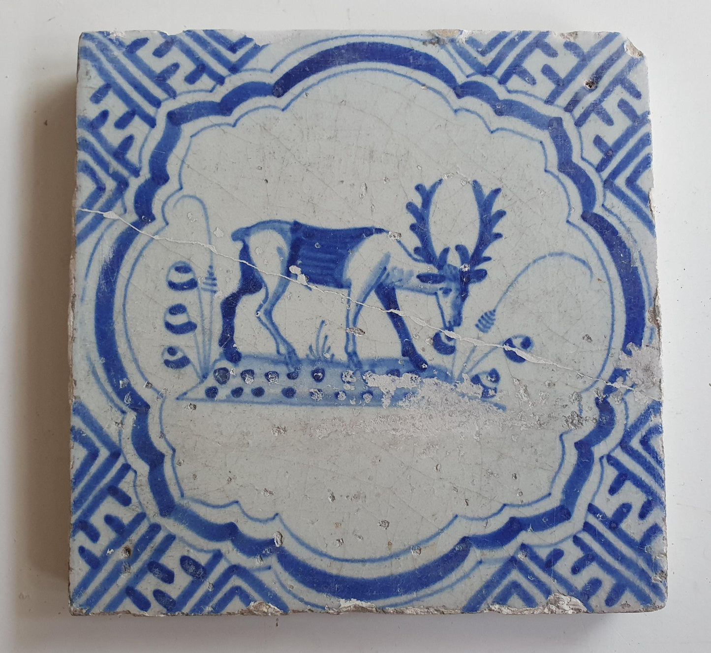 17th Antique Dutch Delft Blue Tile - rabbit with a meander shape - Dated around 1640