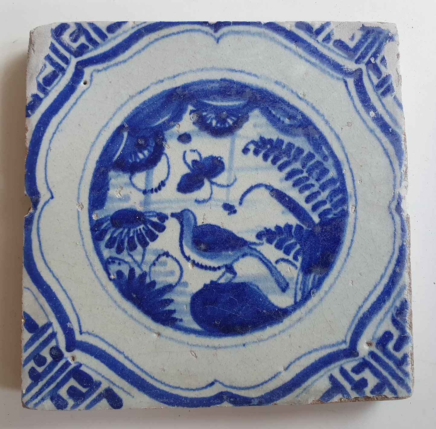 17th Antique Dutch Delft Blue Tile - Chinese garden with a meander shape - Dated around 1640