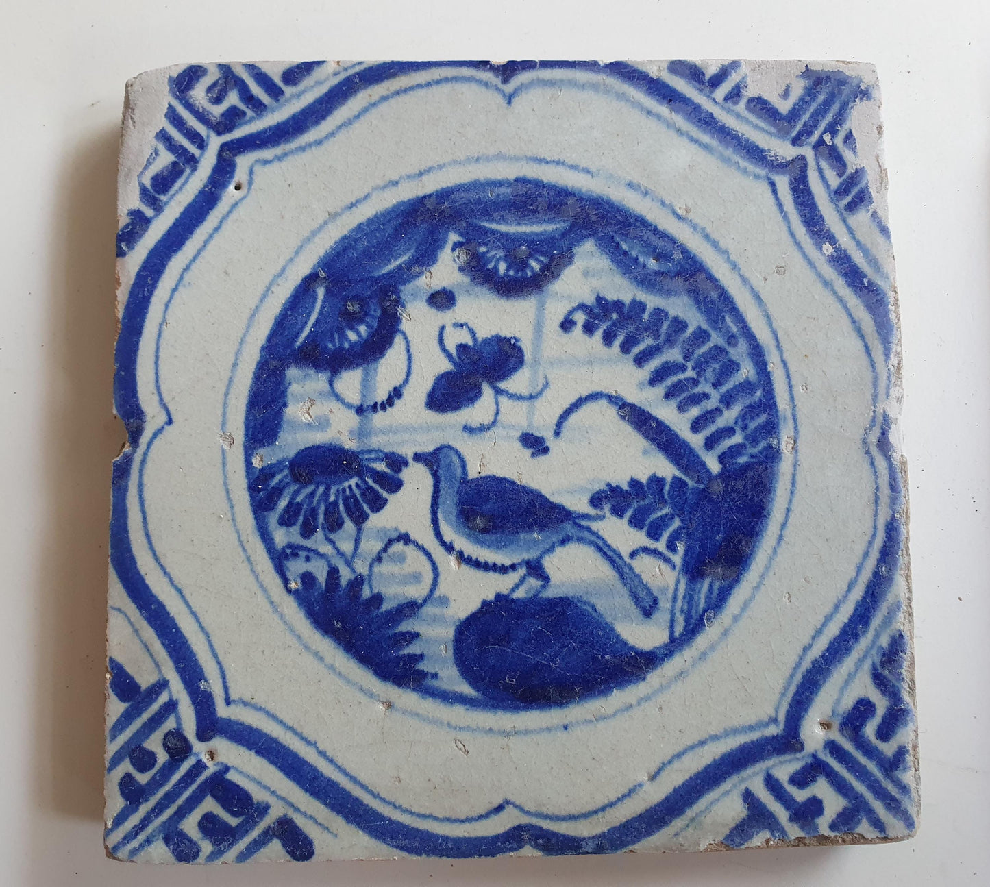 17th Antique Dutch Delft Blue Tile - Chinese garden with a meander shape - Dated around 1640