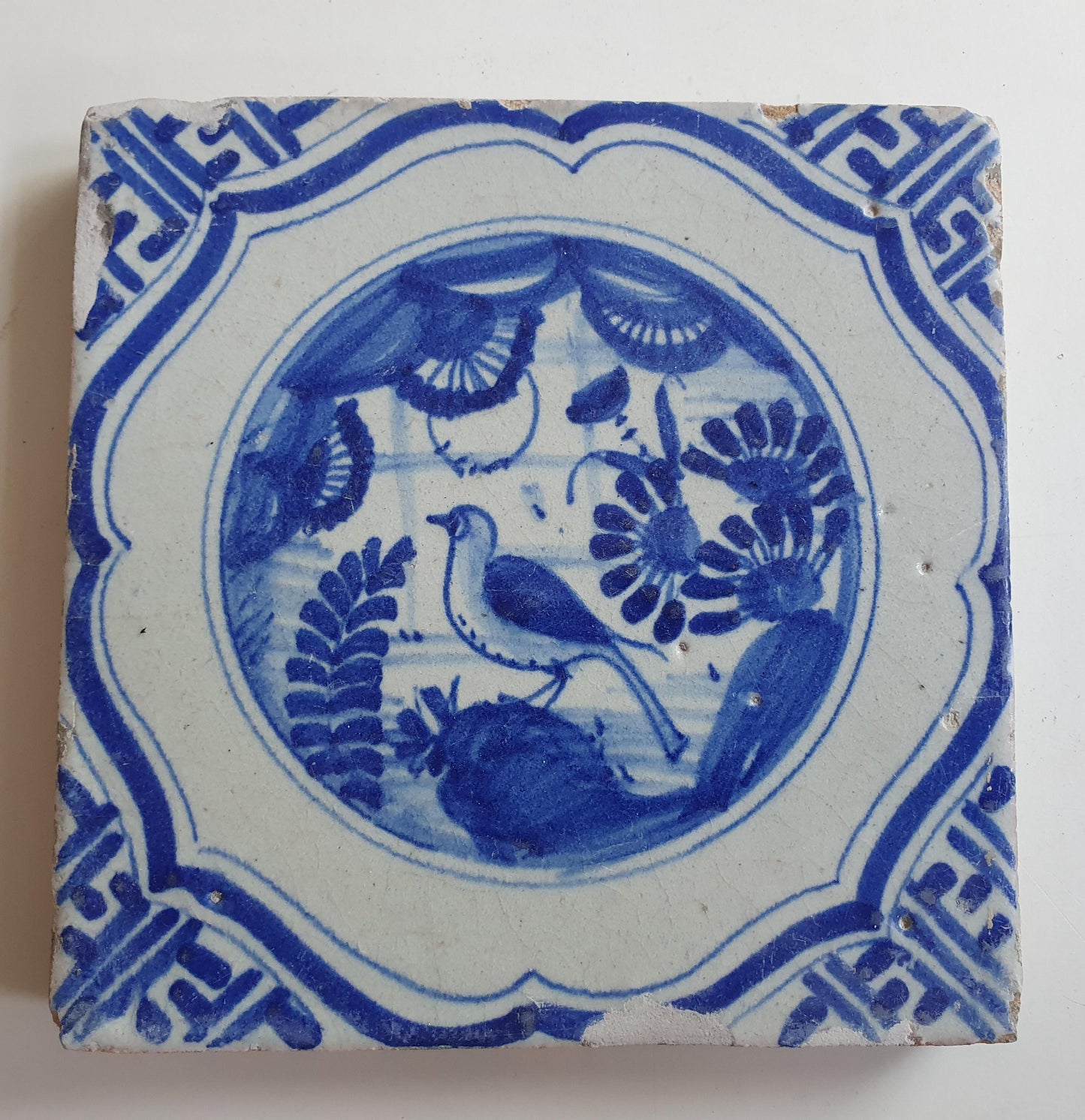 17th Antique Dutch Delft Blue Tile - Chinese garden with a meander shape - Dated around 1640