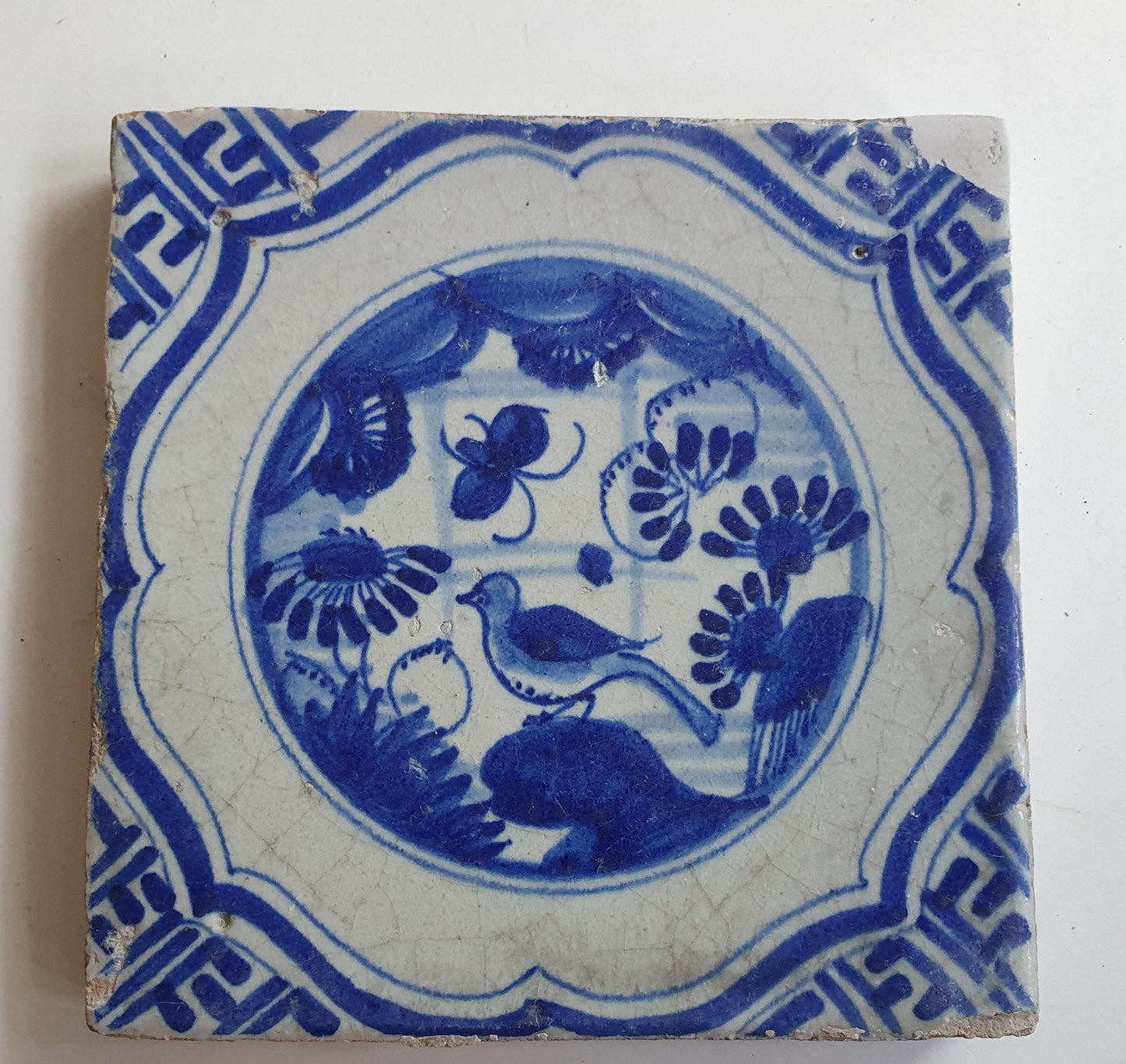 Antique Delft Tile – 17th Century Dutch walltile, Chinese Garden Scene, Meander Shape