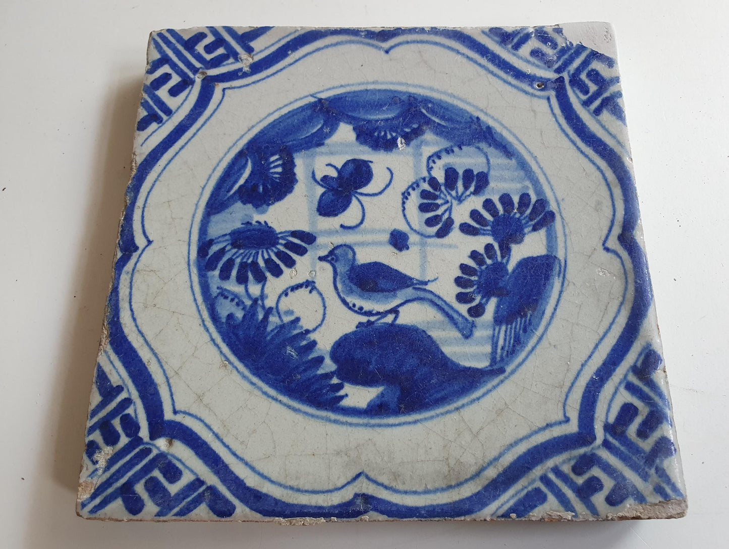Antique Delft Tile – 17th Century Dutch walltile, Chinese Garden Scene, Meander Shape