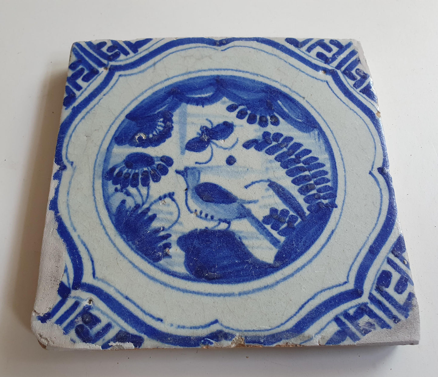17th Antique Dutch Delft Blue Tile - Chinese garden with a meander shape - Dated around 1640