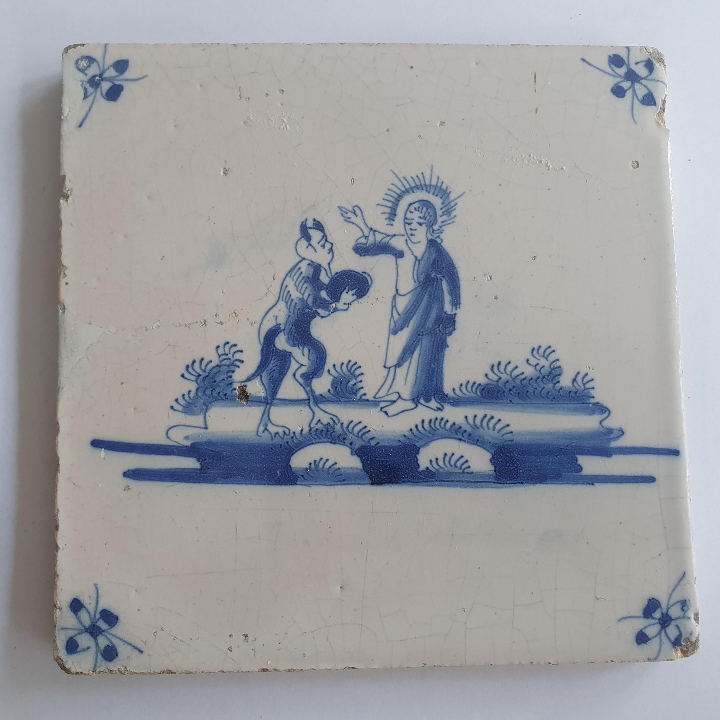 This original 18th century (c. 1700) Delft tile bibel.