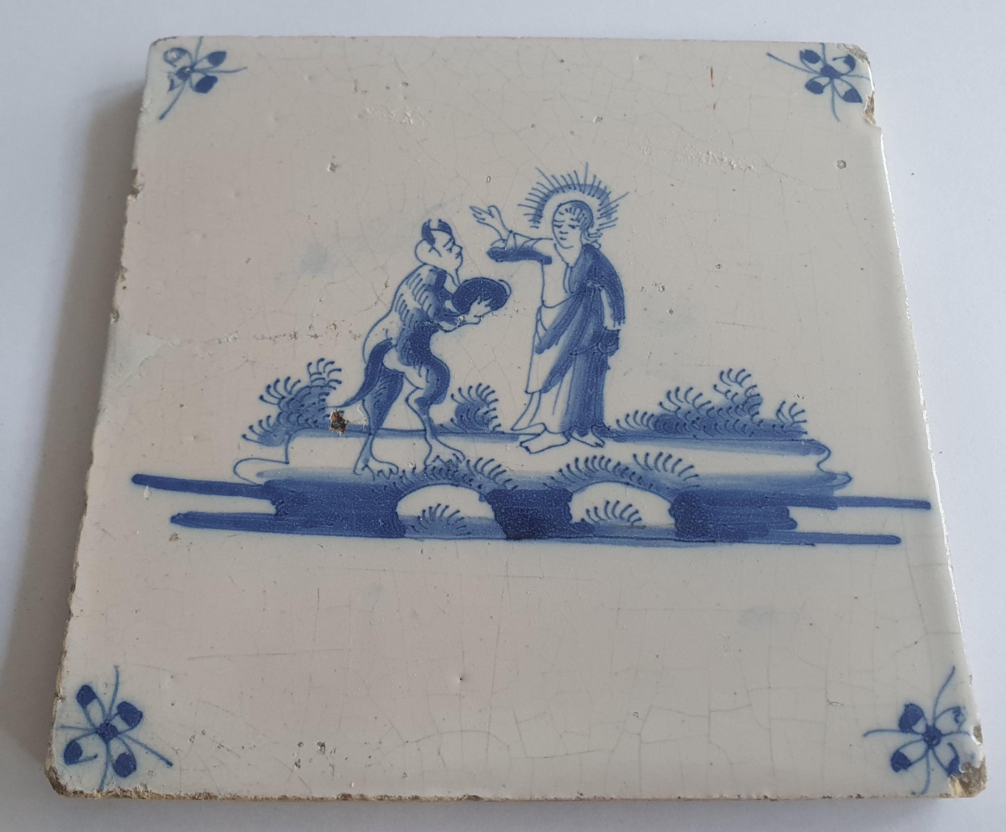 This original 18th century (c. 1700) Delft tile bibel.