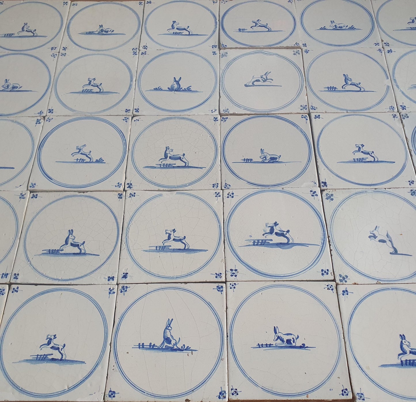 Set of 40 Antique Delft Blue Animal Tiles, 18th Century circle springer