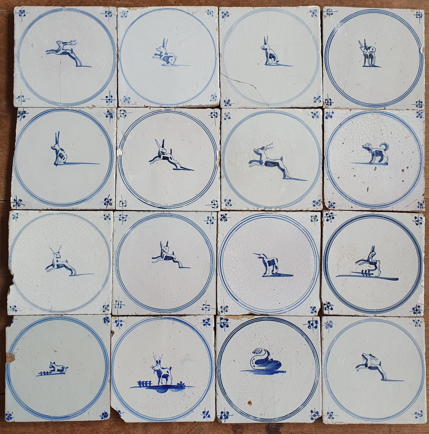 Set of 16 Antique Delft Tiles, 18th Century Animal Motifs circle springer