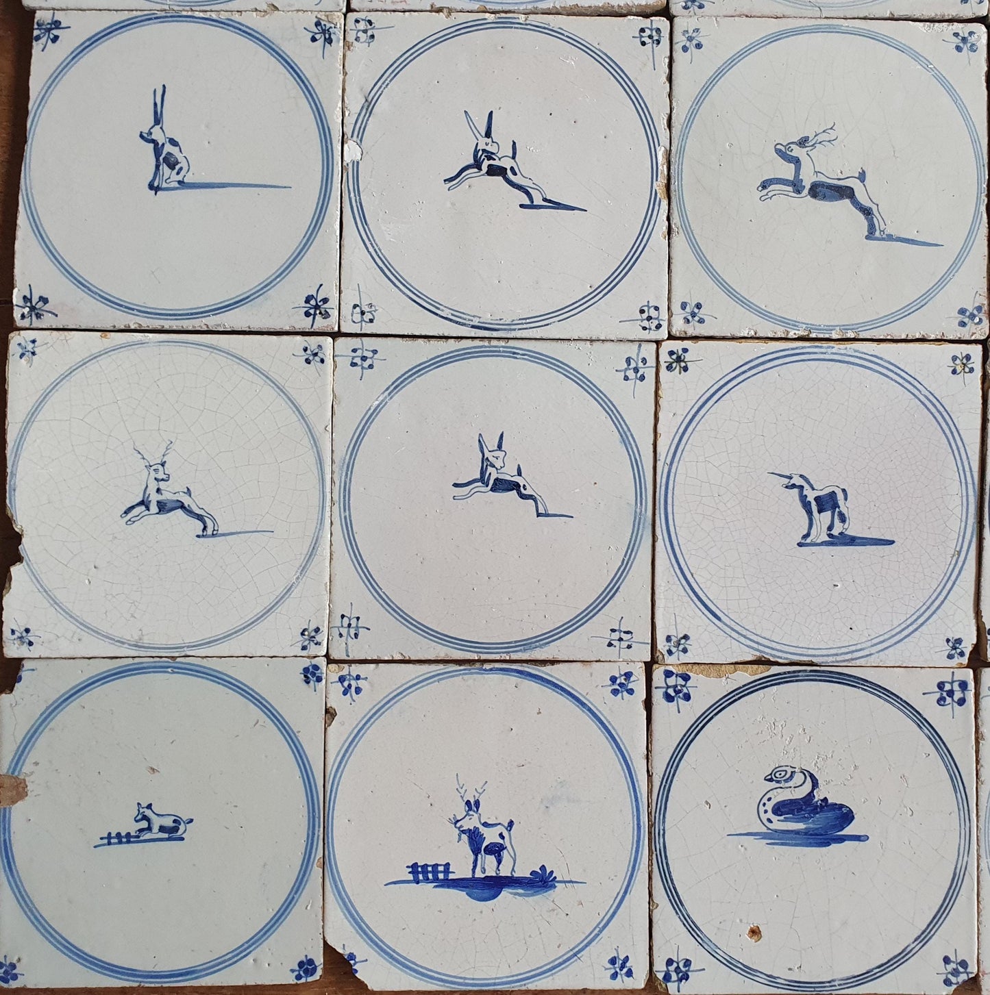Set of 16 Antique Delft Tiles, 18th Century Animal Motifs circle springer