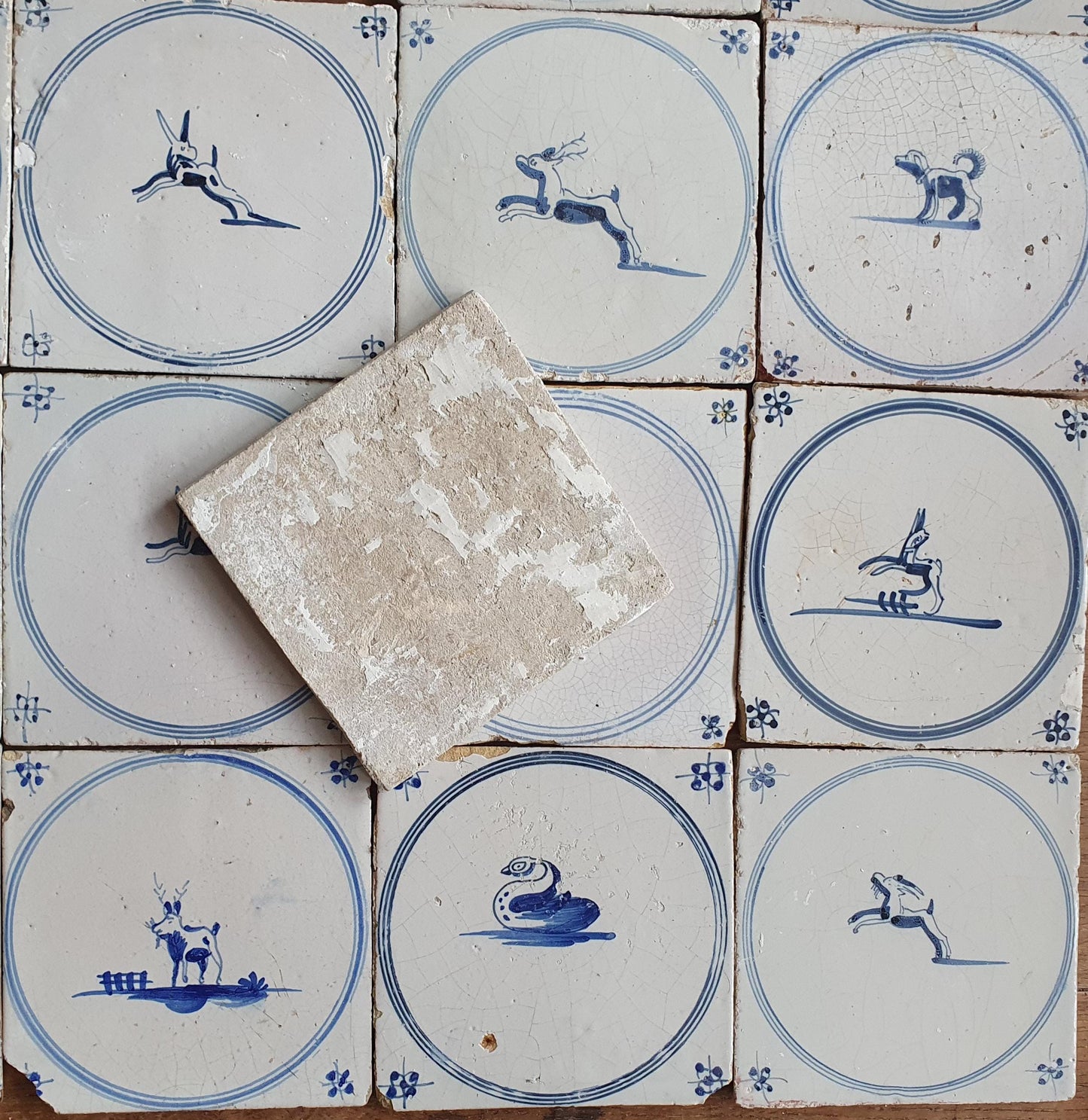 Set of 16 Antique Delft Tiles, 18th Century Animal Motifs circle springer